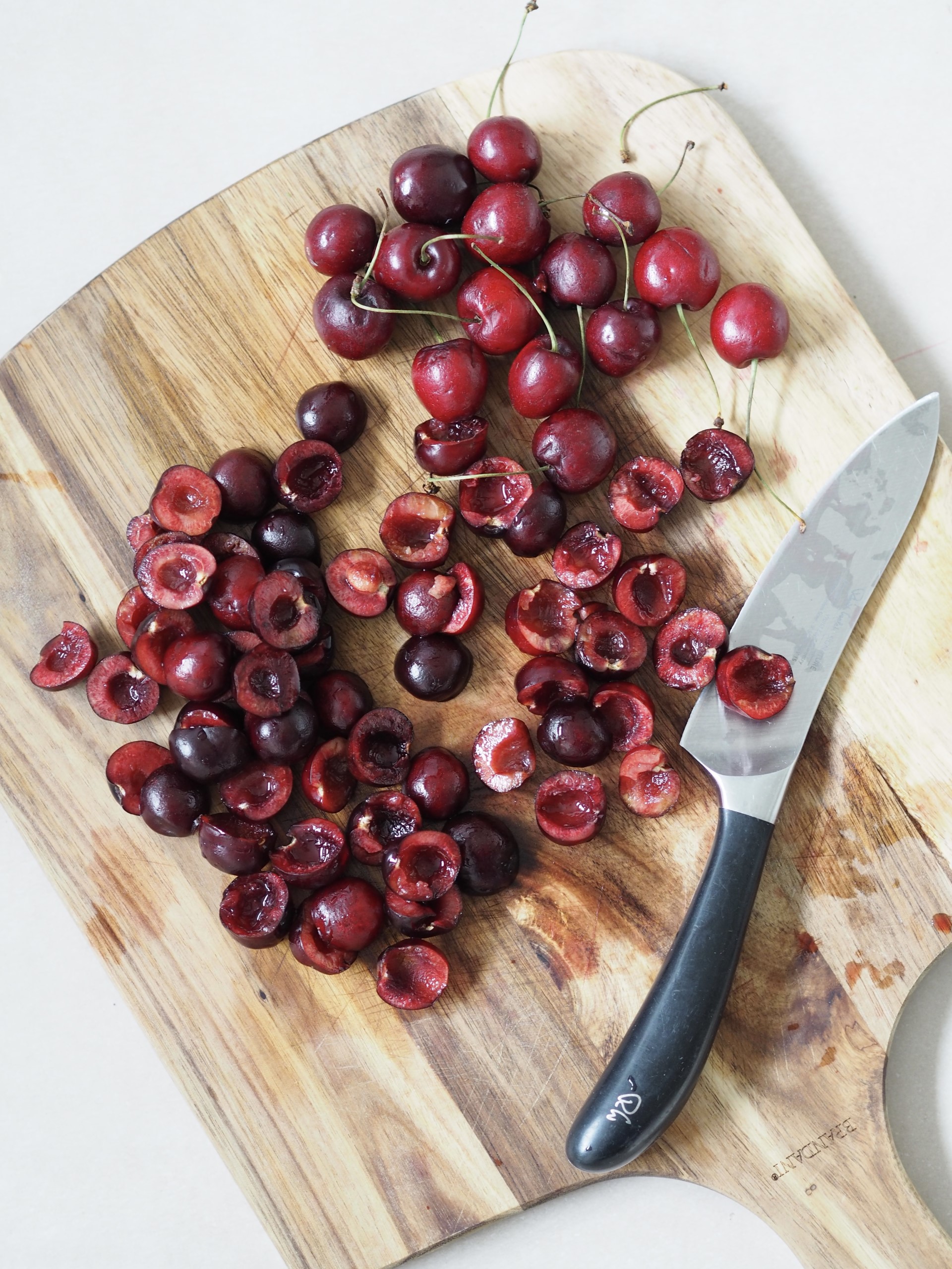 Cut and pit fresh cherries.