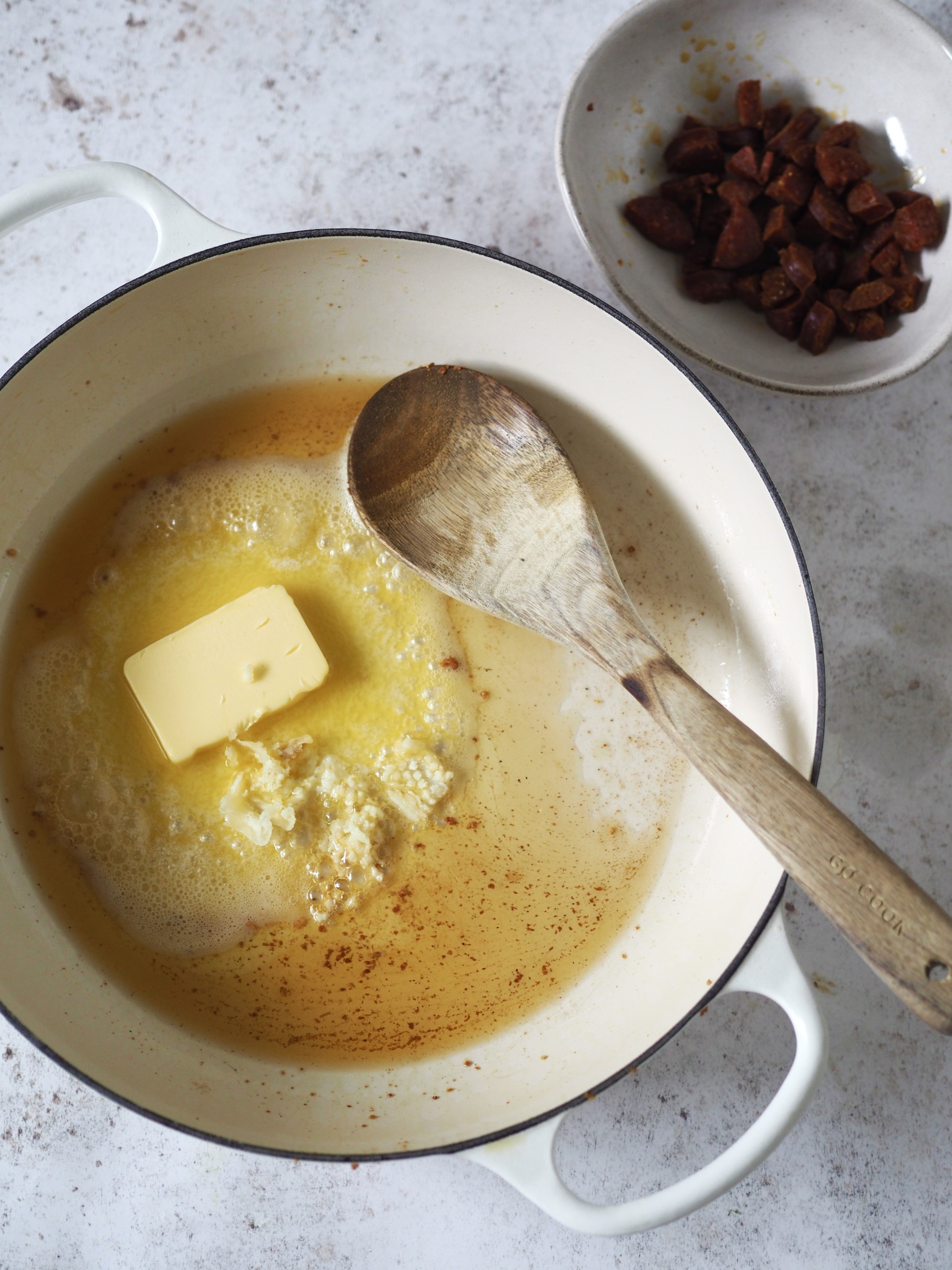 Cooking the chorizo until crisp