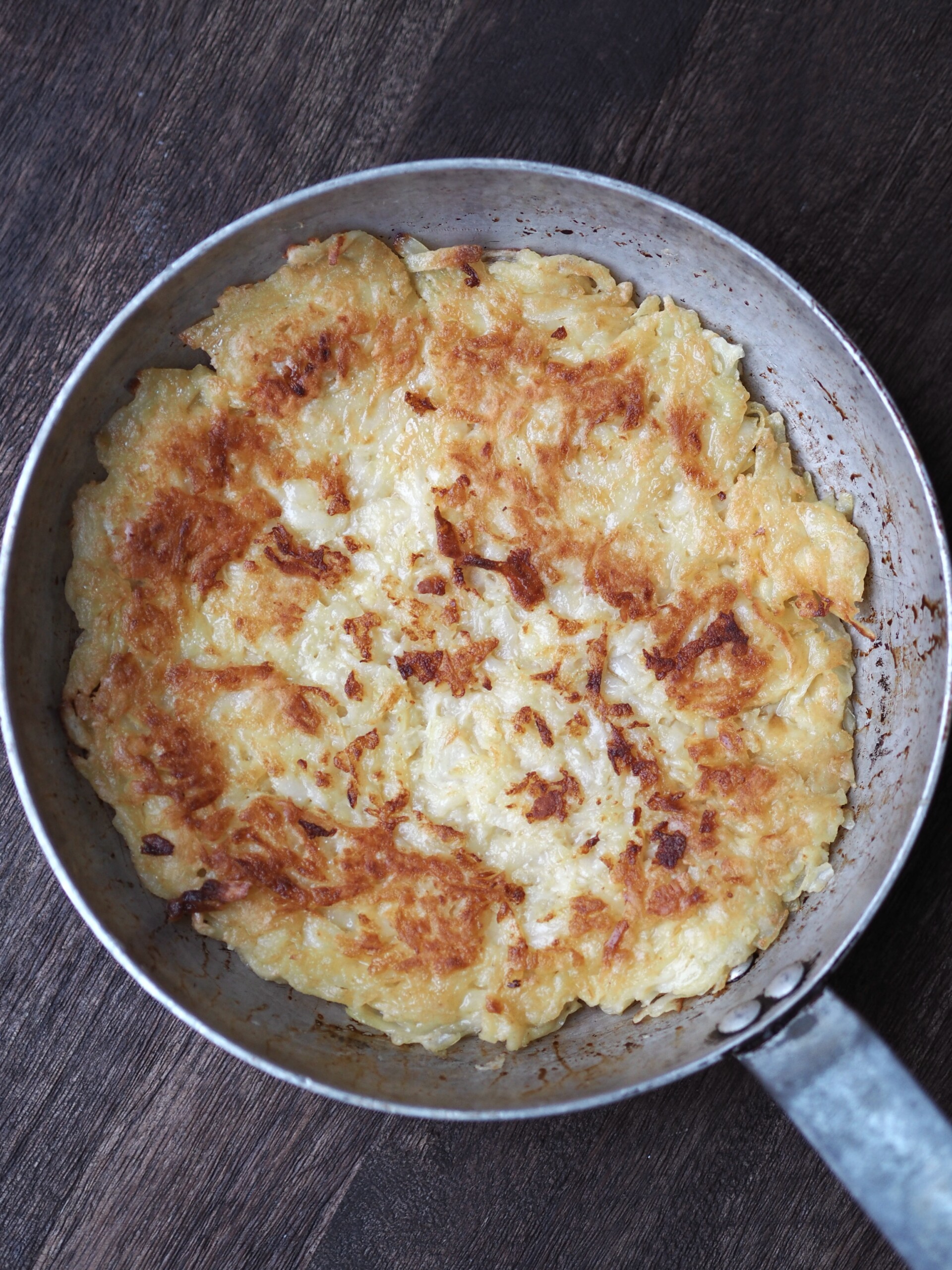 Frying the potato-onion mix.