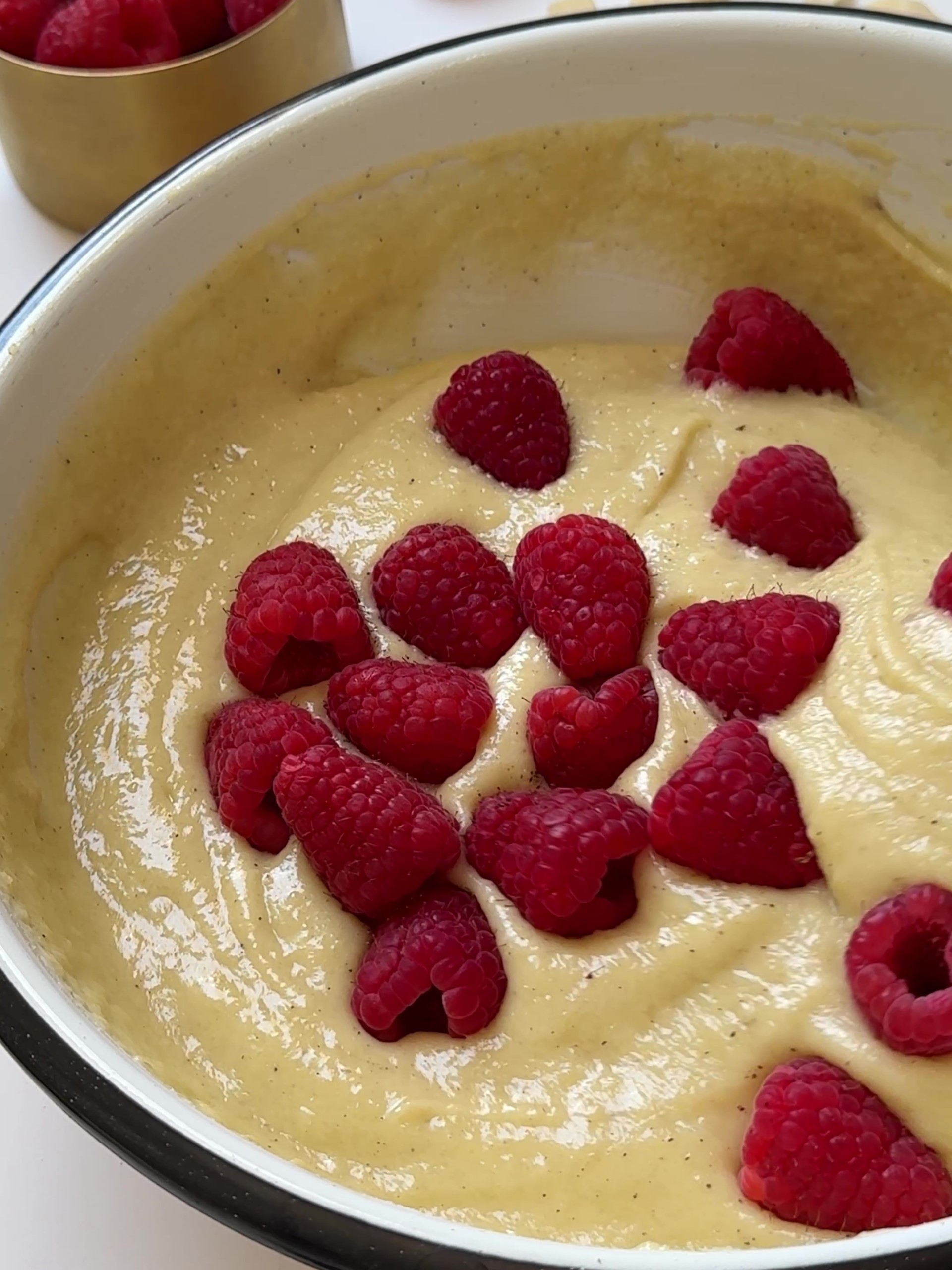 Adding the lemon zest and half of the raspberries