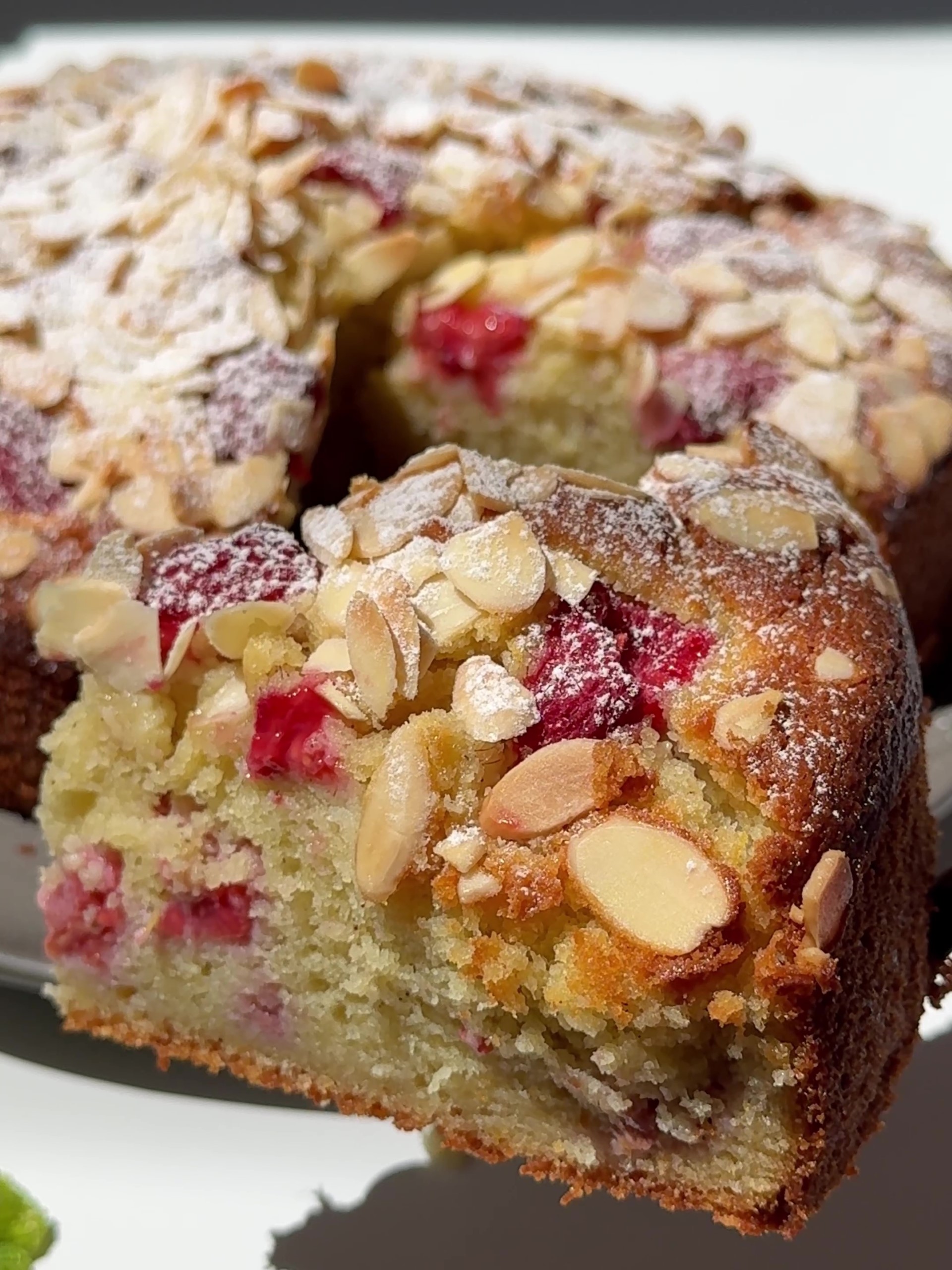 Sliced Raspberry, Almond and Ricotta Cake