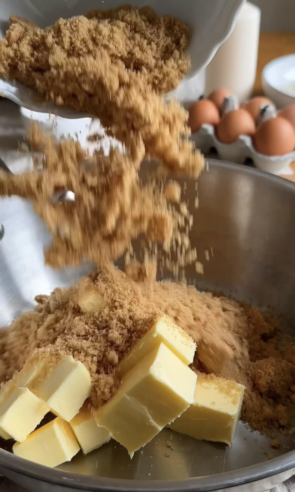 adding butter and brown sugar to pan.