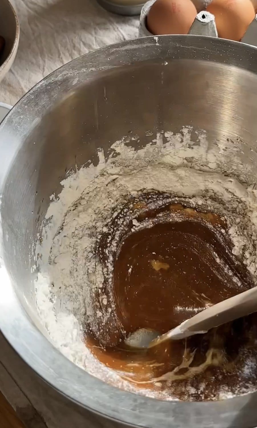 folding flour into blondie batter.