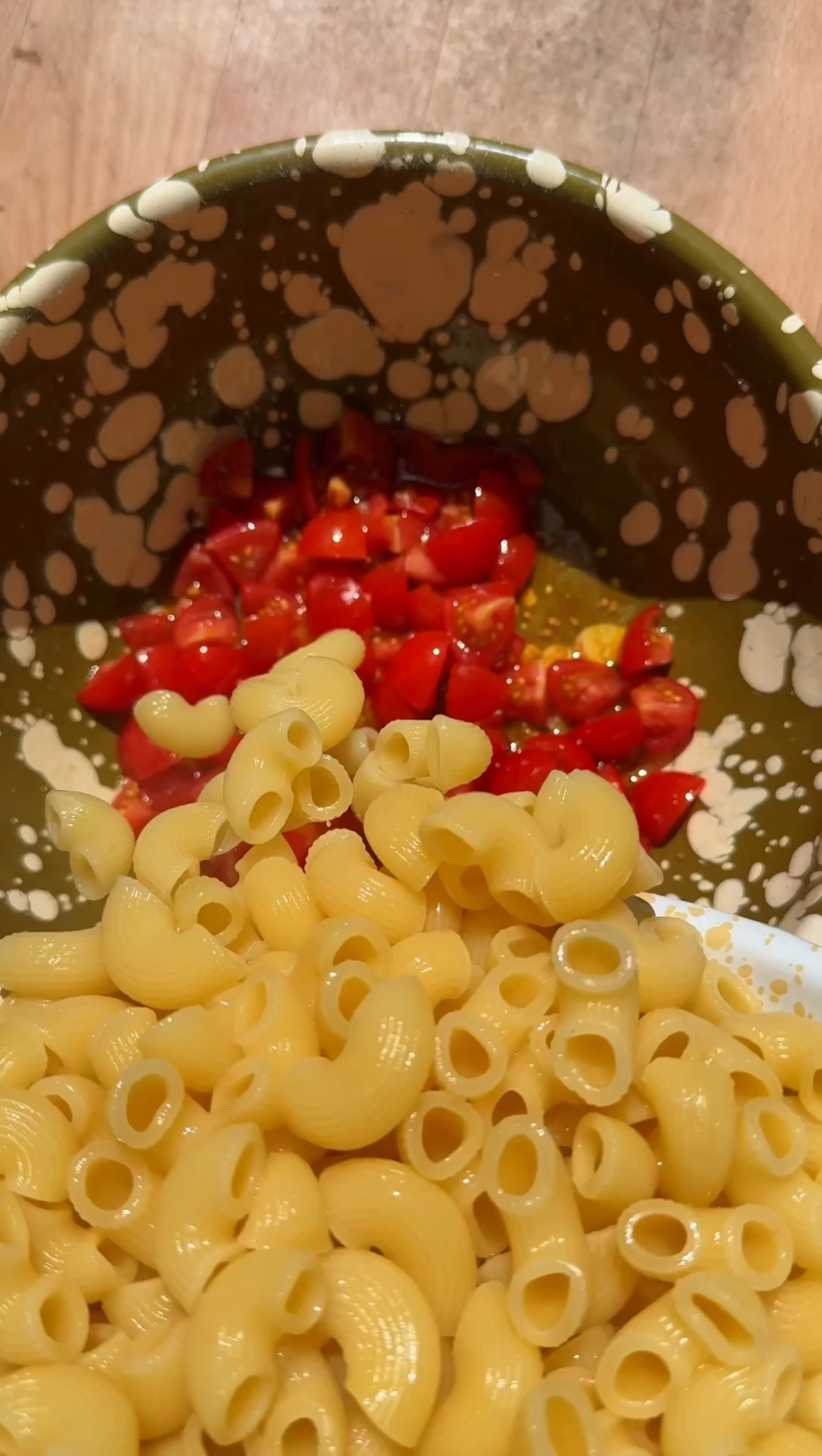 adding pasta to the tomatoes