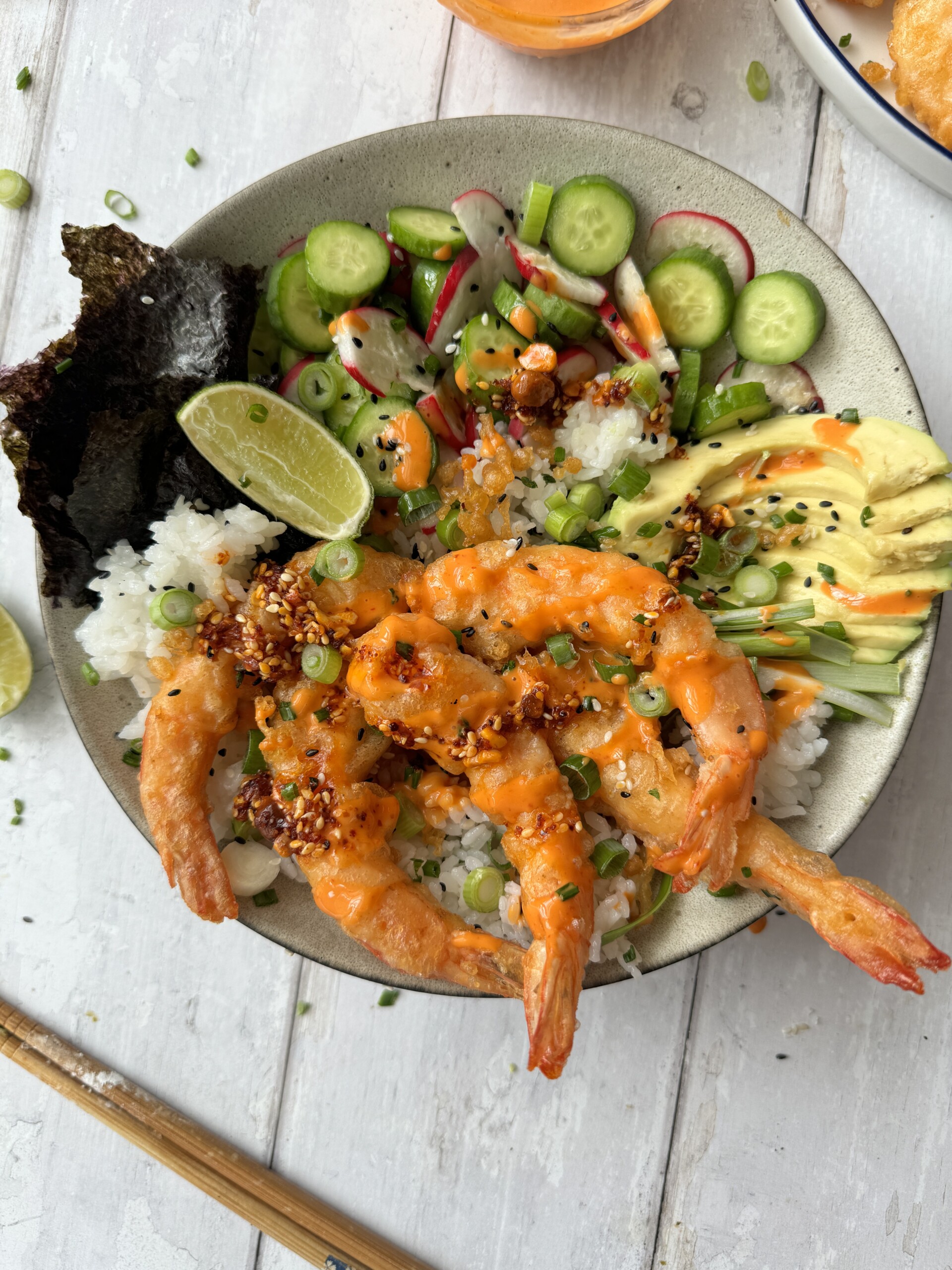 ebi tempura rice bowl with avocado and cucumber