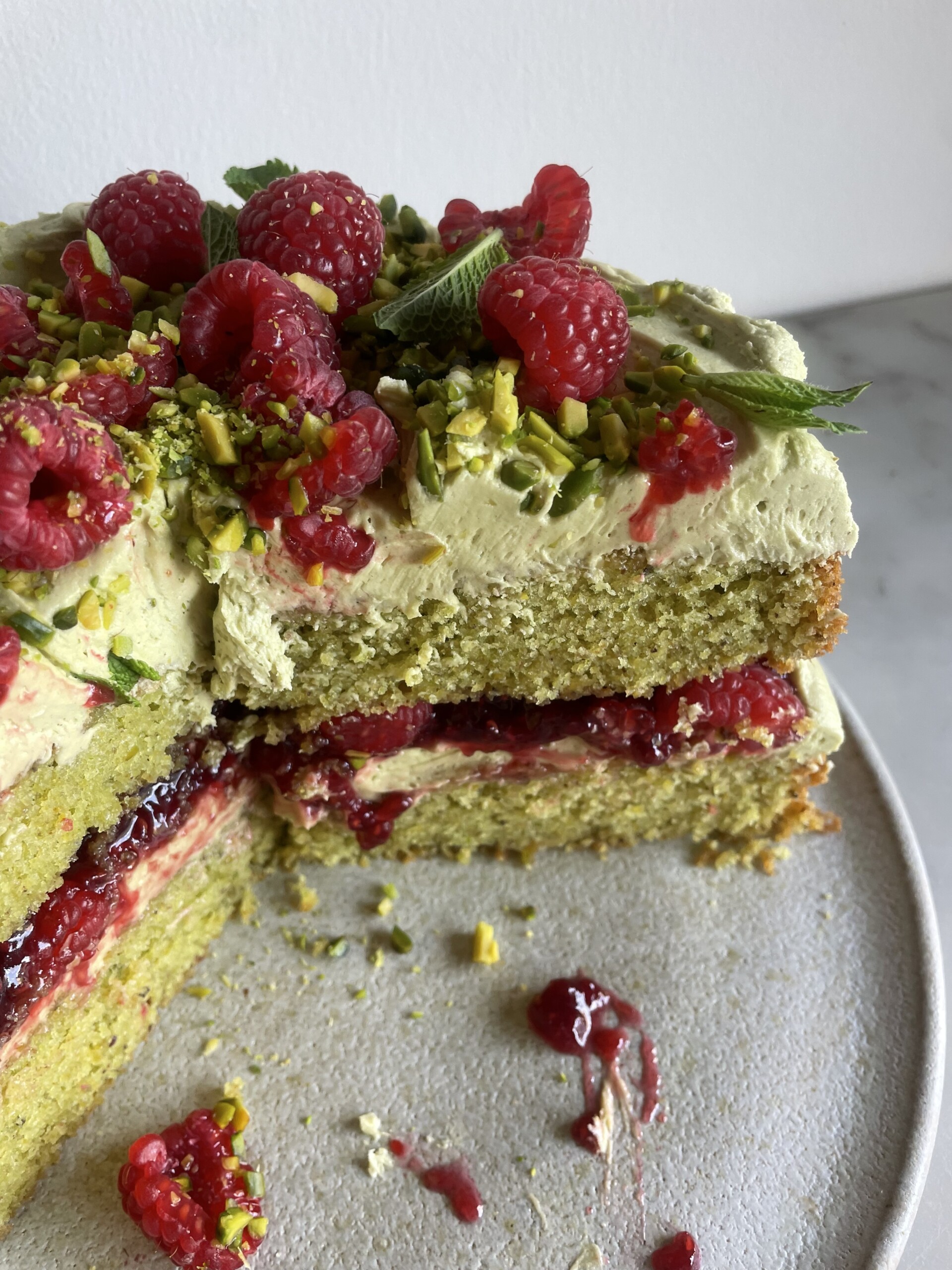 pistachio raspberry cake cross section