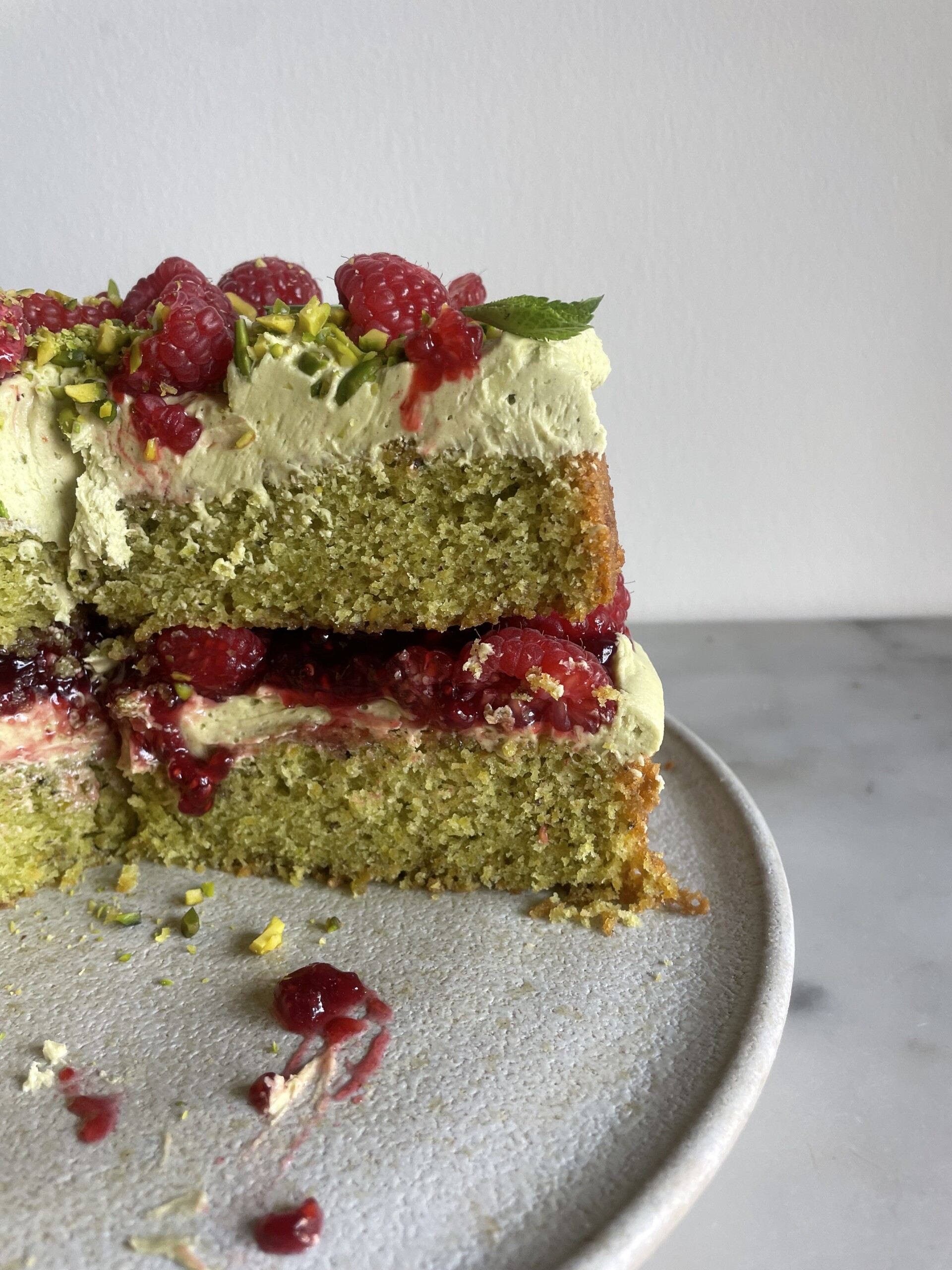 pistachio raspberry cake cross section