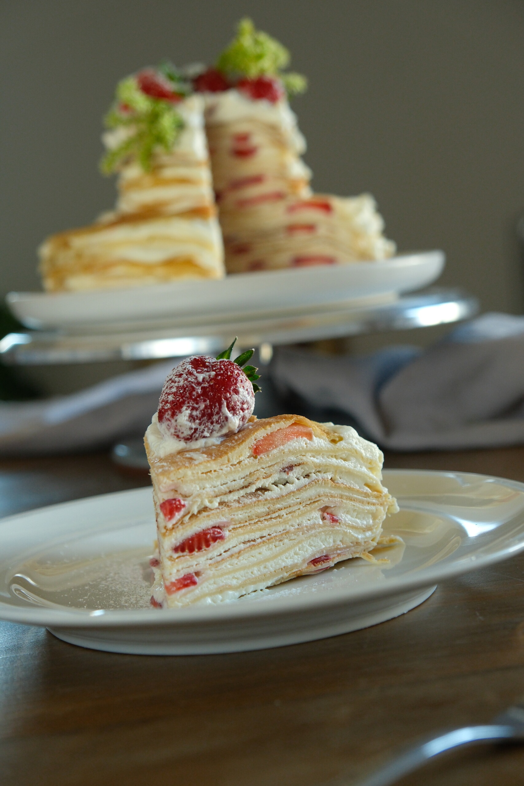 slice strawberry mille crepe cake