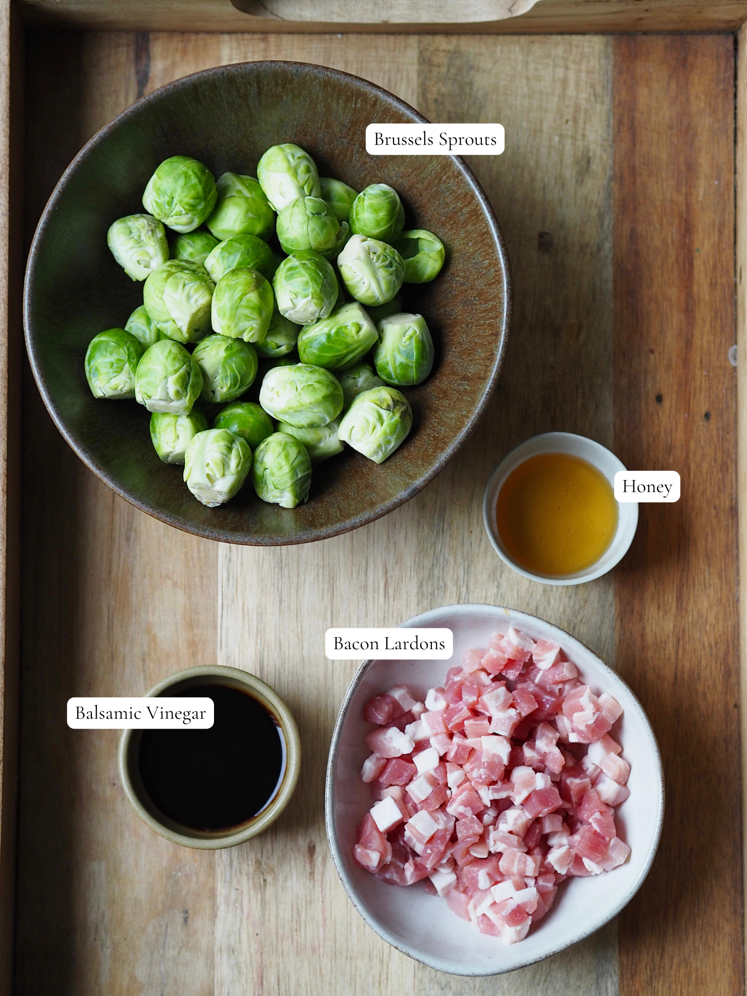 Labelled ingredients to make Honey Bacon Balsamic Brussels Sprouts.