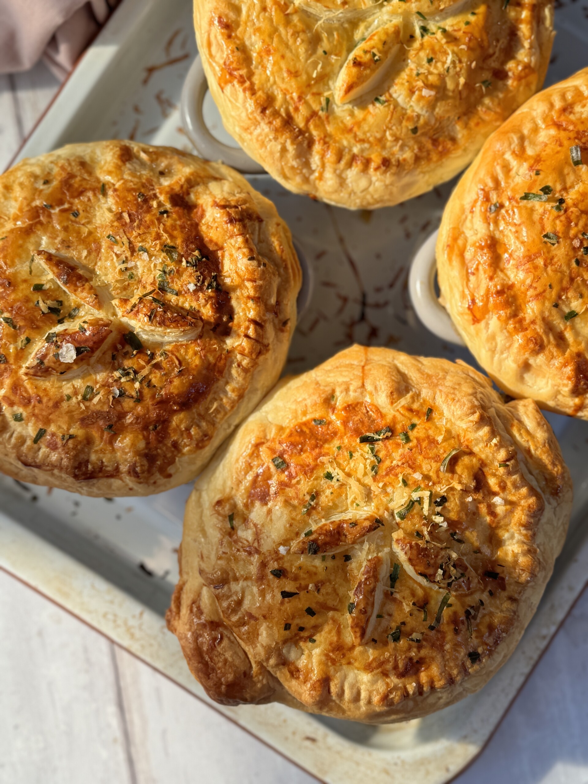 chicken mini pot pies on a tray