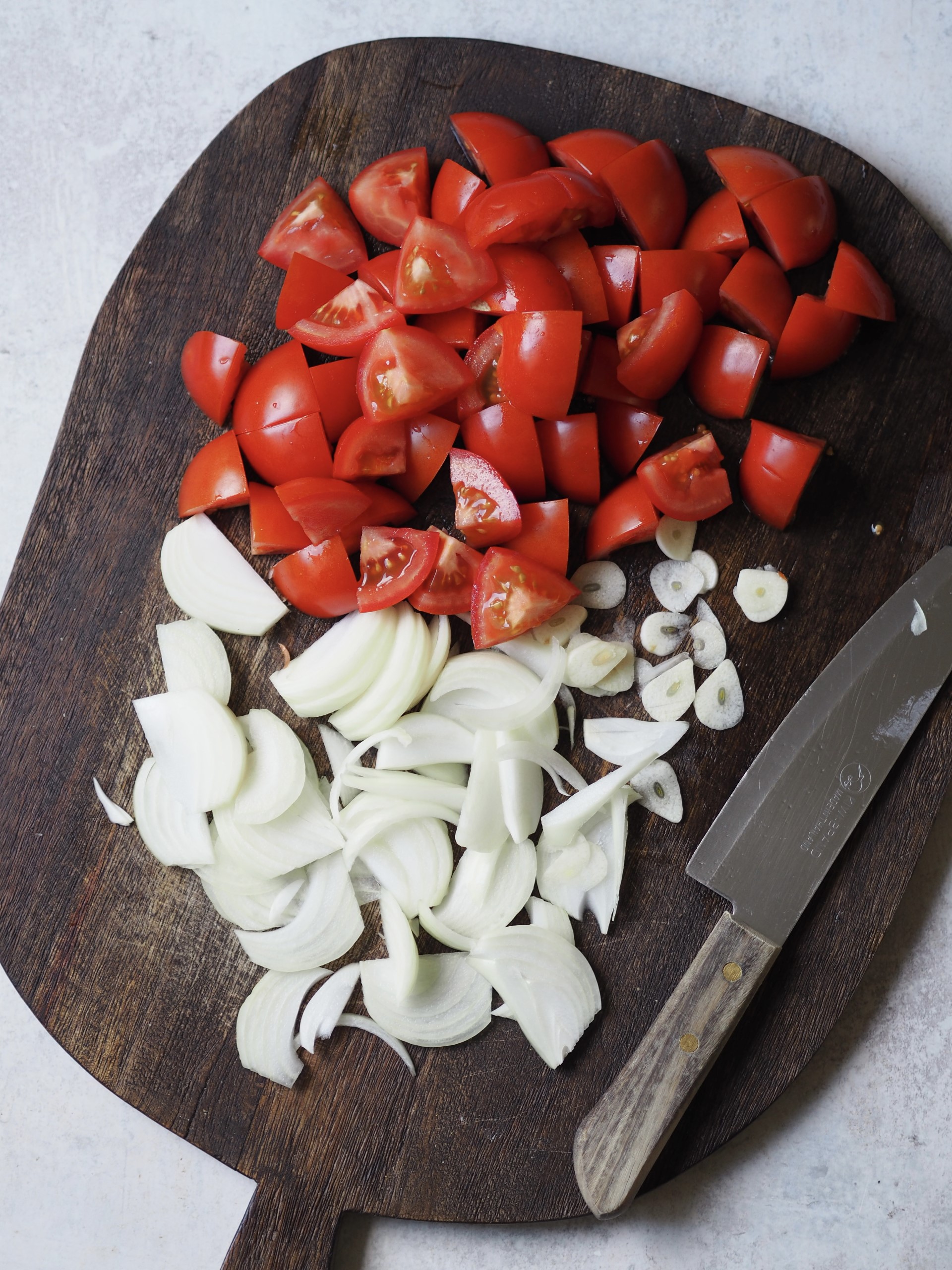 Chopped onions, tomato and garlic.