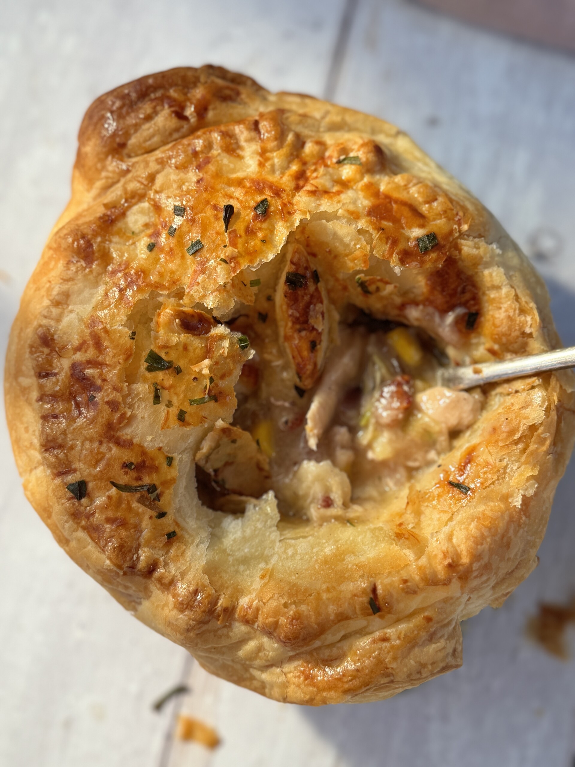 chicken mini pot pie with a spoon