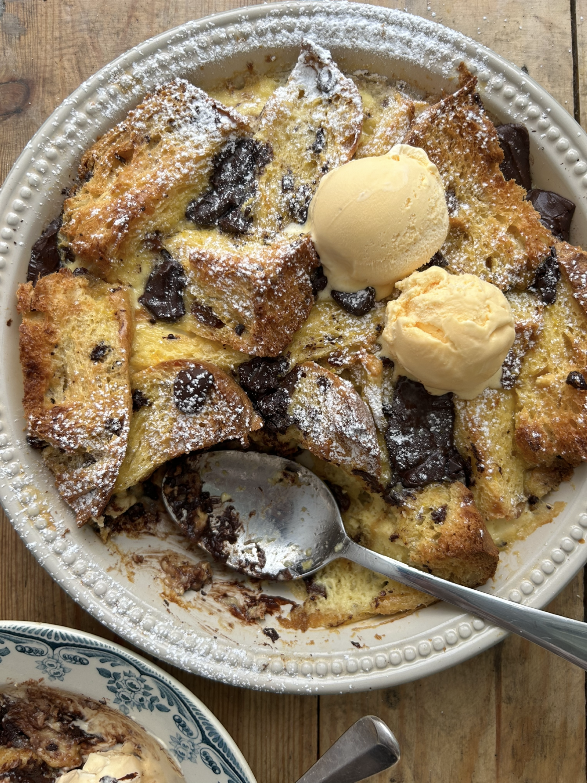 Dishing up Panettone, Orange and Dark Chocolate Bread and Butter Pudding