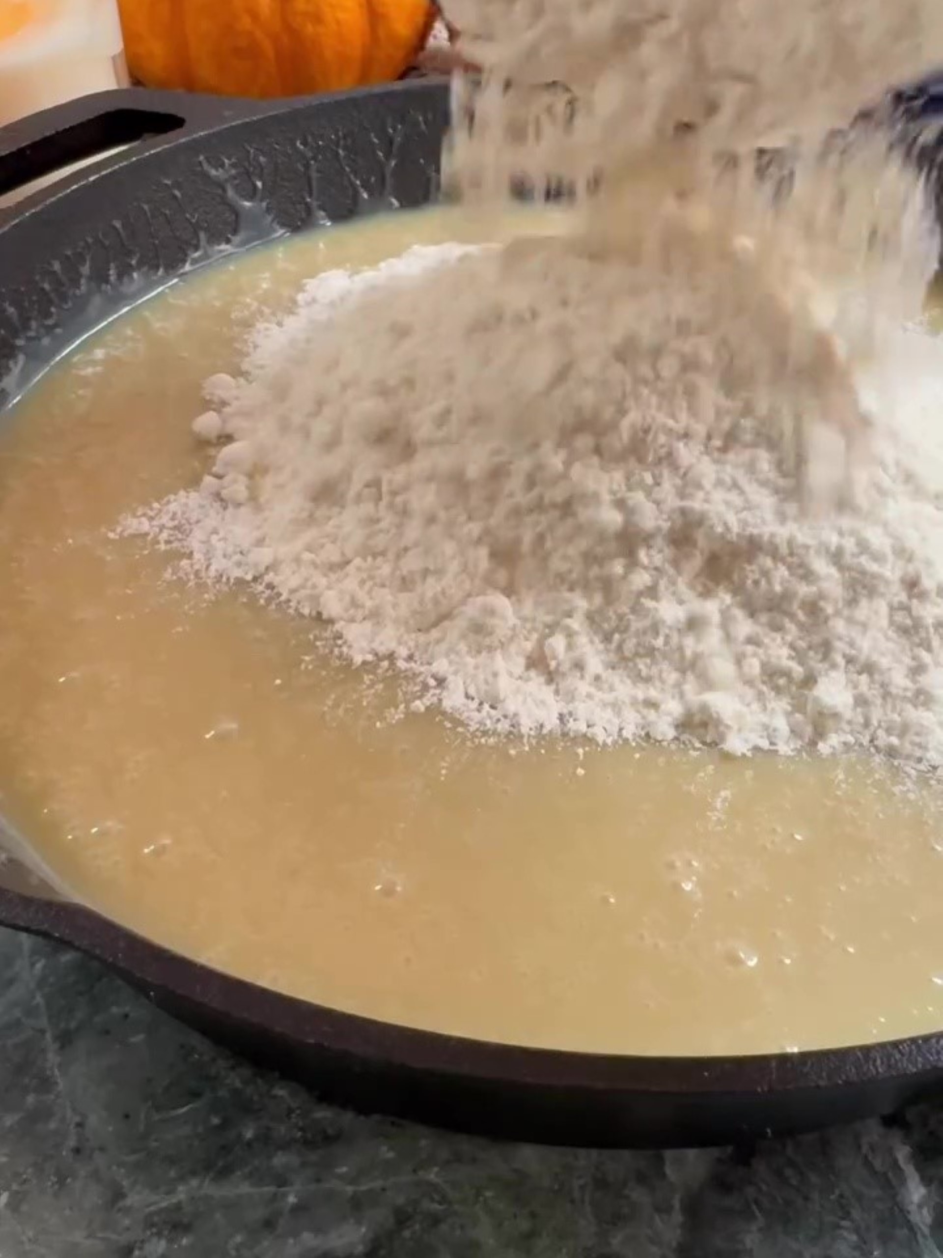 Adding flour to the butter mix