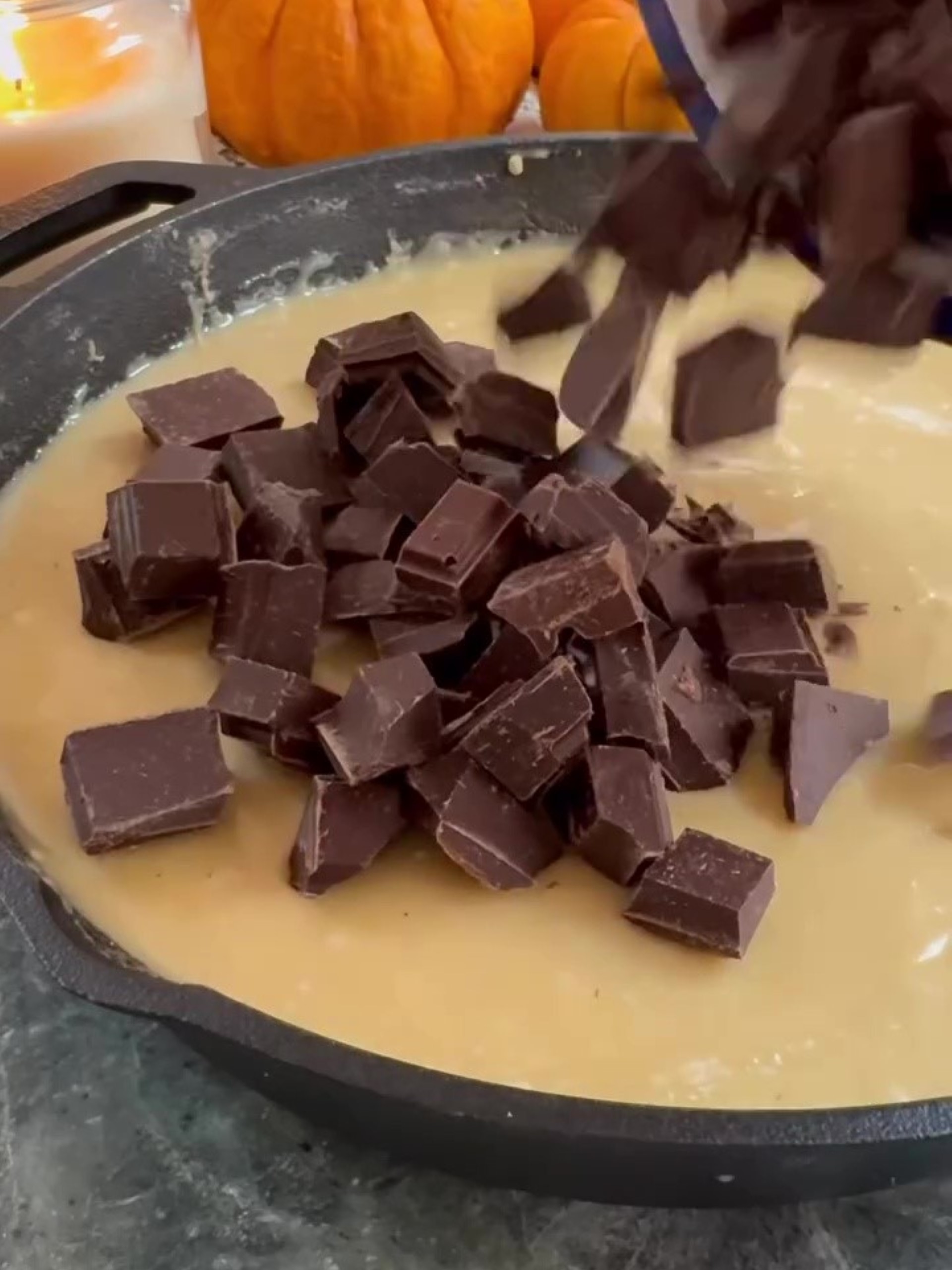 Adding chocolate to the mixture