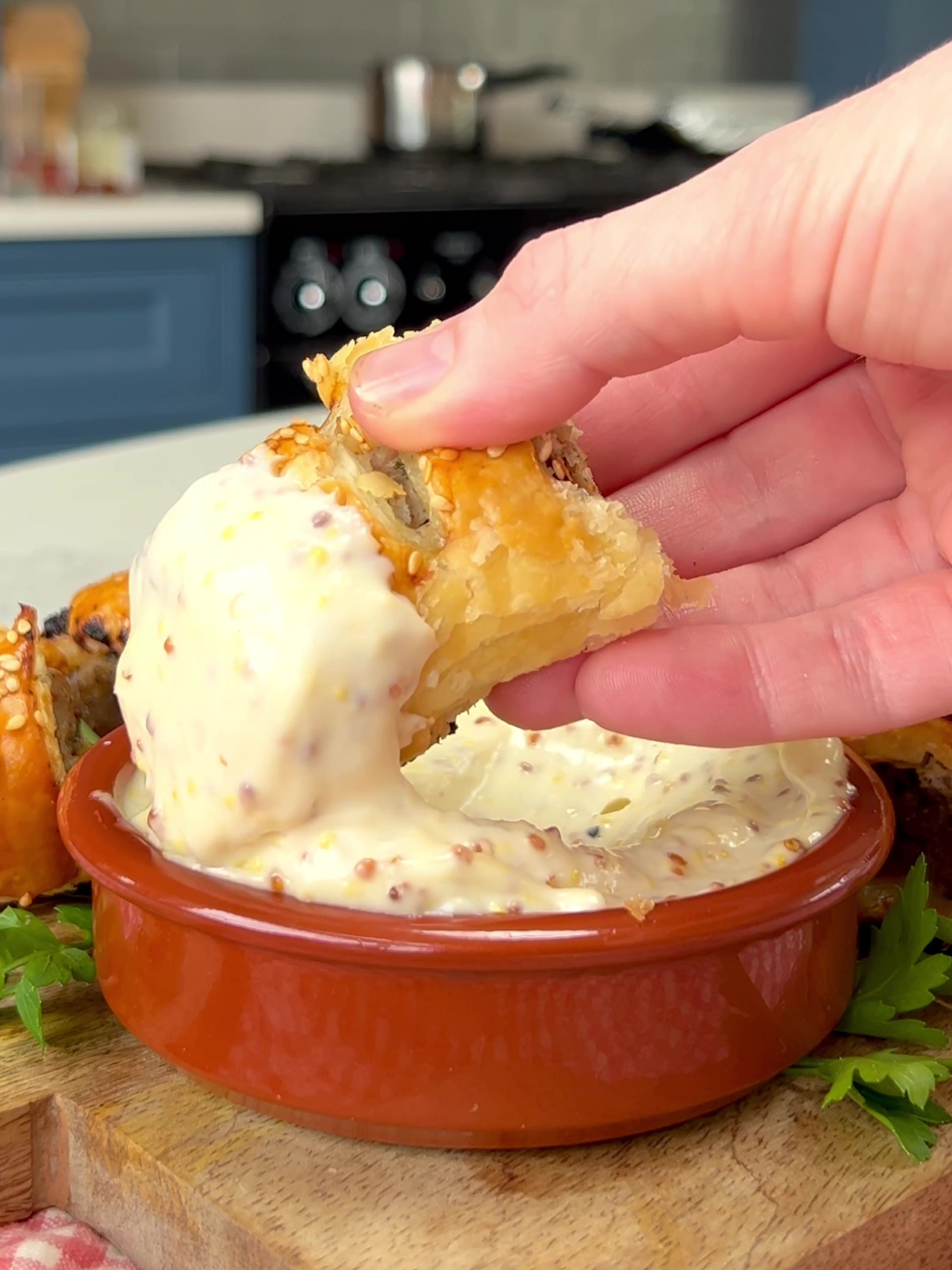 Dipping sausages in dip