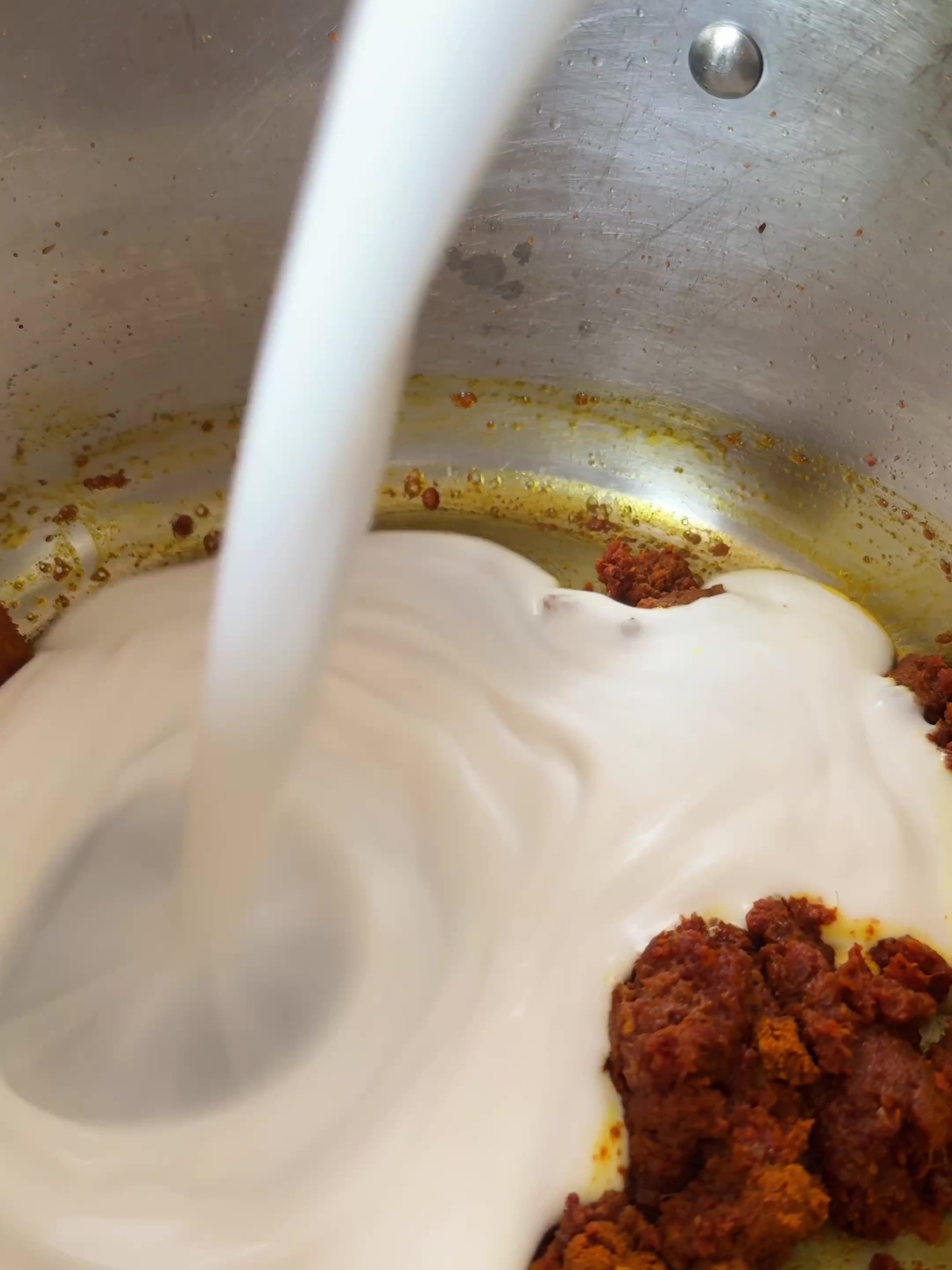 Adding coconut milk