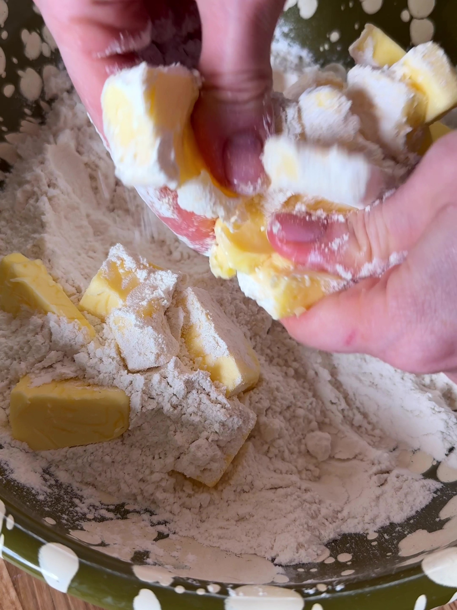 Mixing butter and flour with fingertips