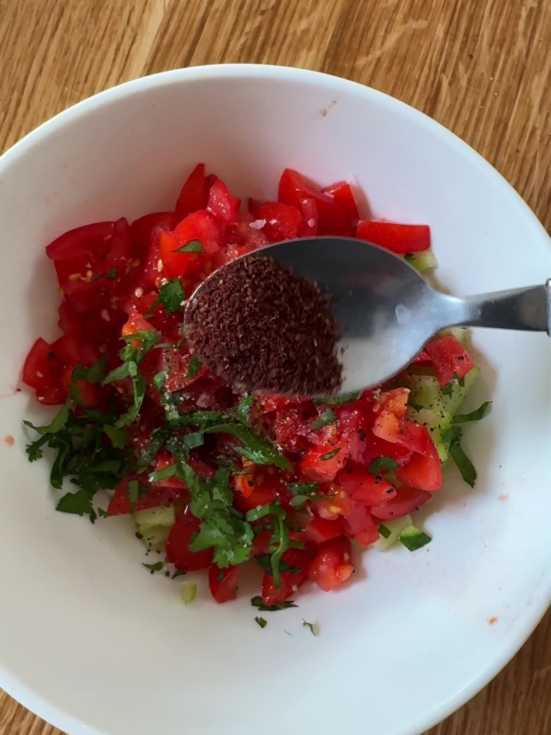 Making the tomato and cucumber salad