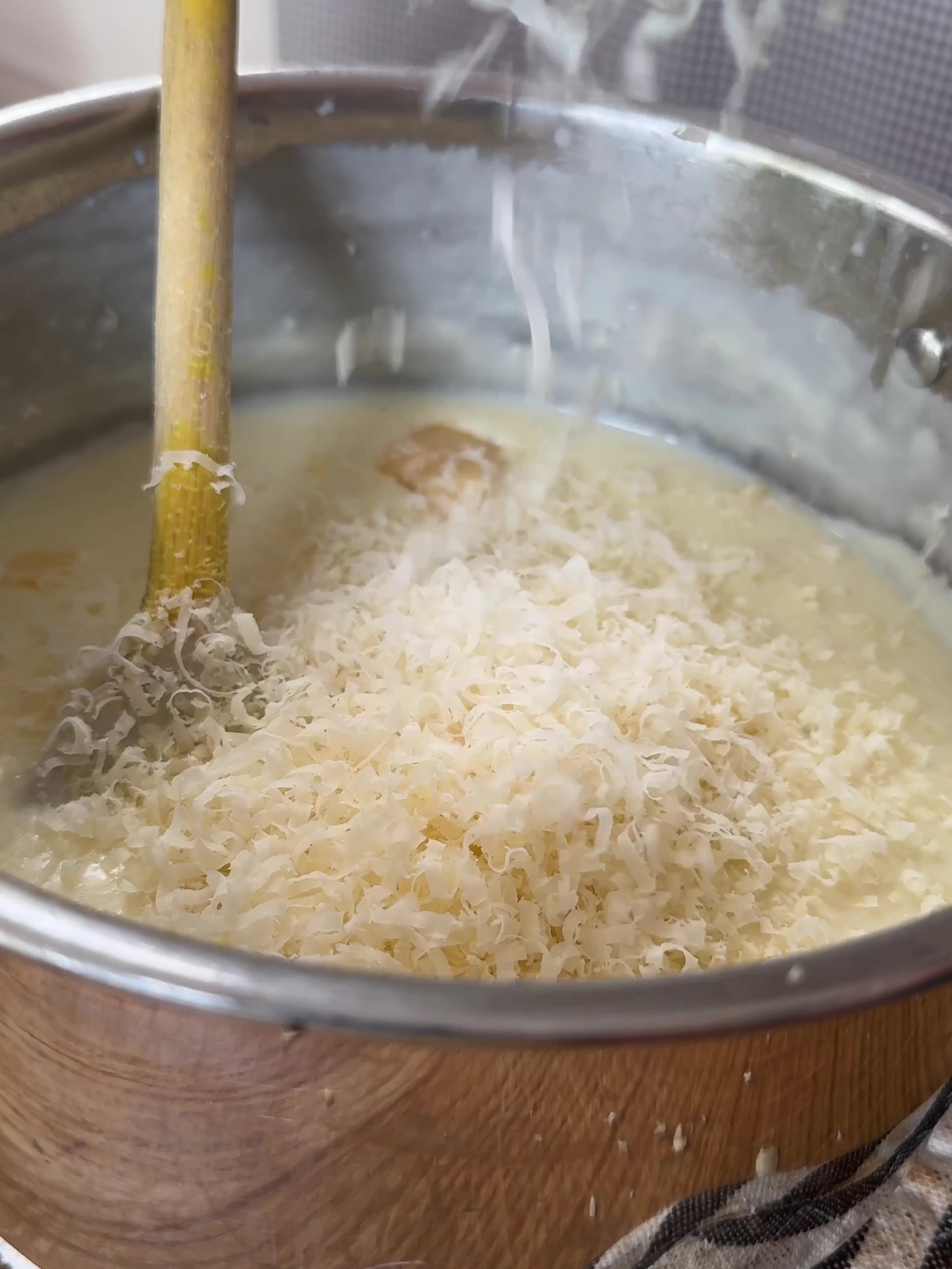 Adding cheese to sauce