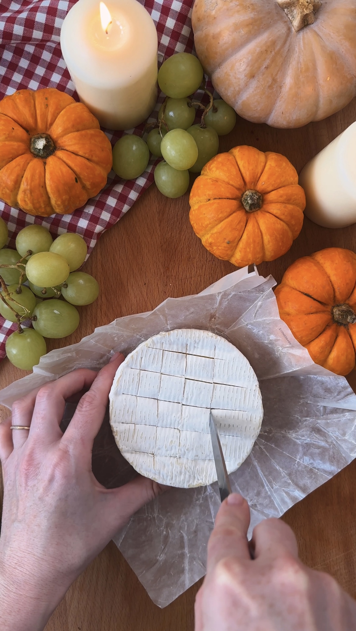 scoring the brie before inserting garlic