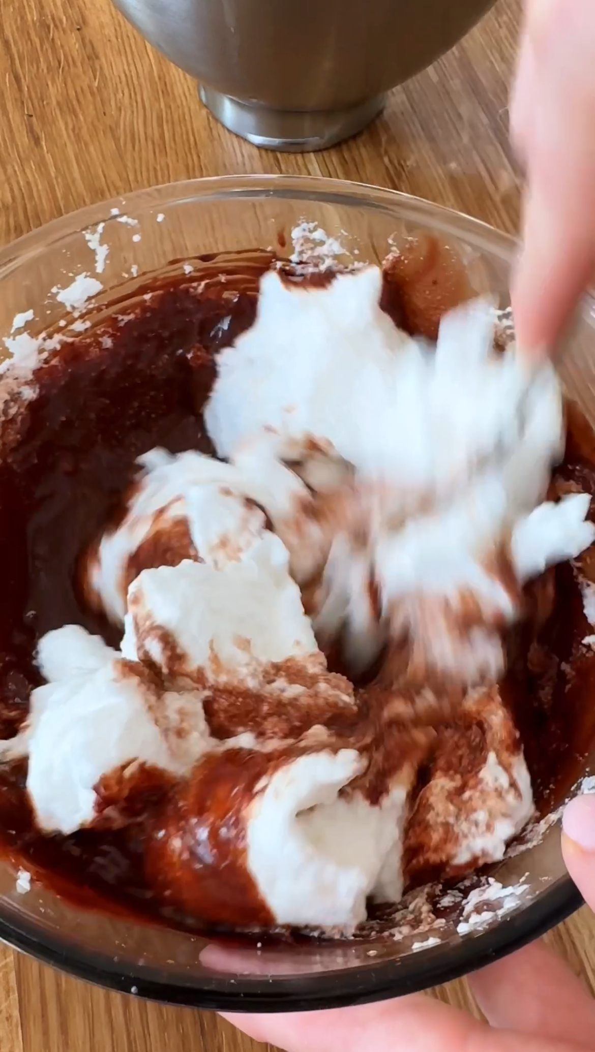 adding egg whites to the chocolate