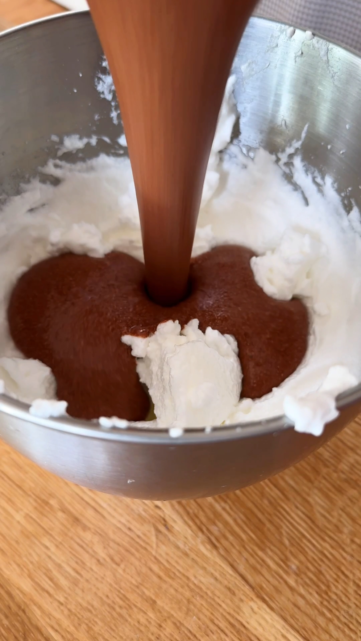 adding chocolate to the egg whites