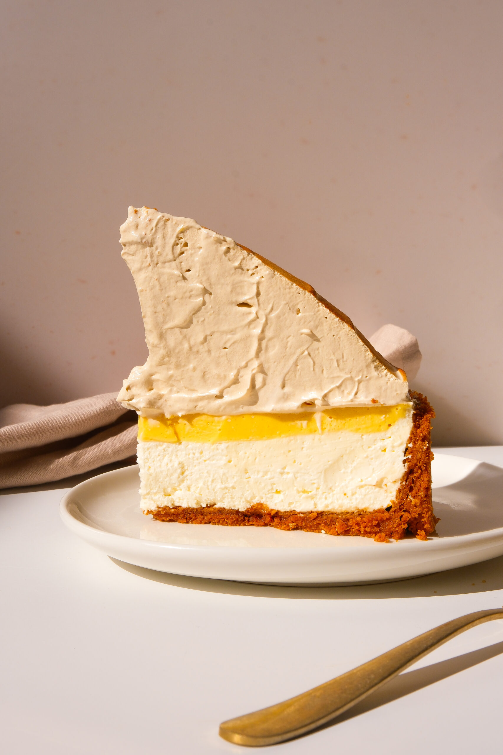 slice of lemon meringue cheesecake