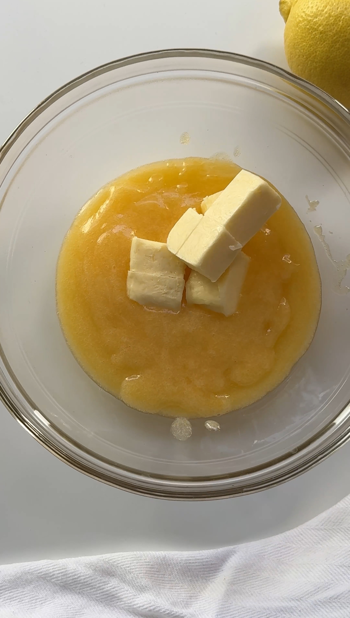 stirring butter into lemon curd