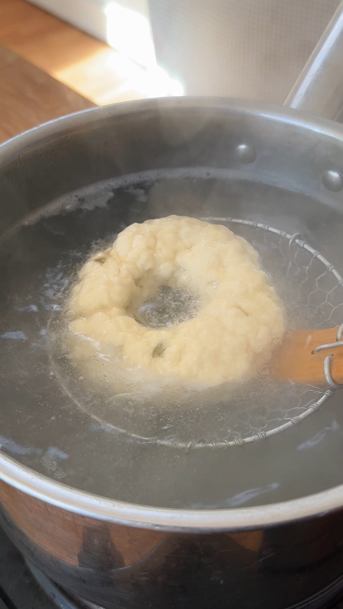 boiling bagels in water.