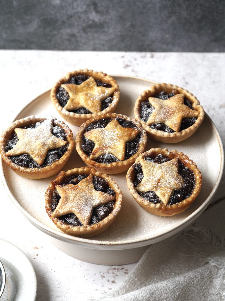 Cake stand of star topped mince pies.