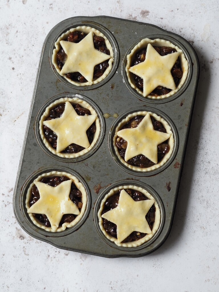 Tray of uncooked mince pies.