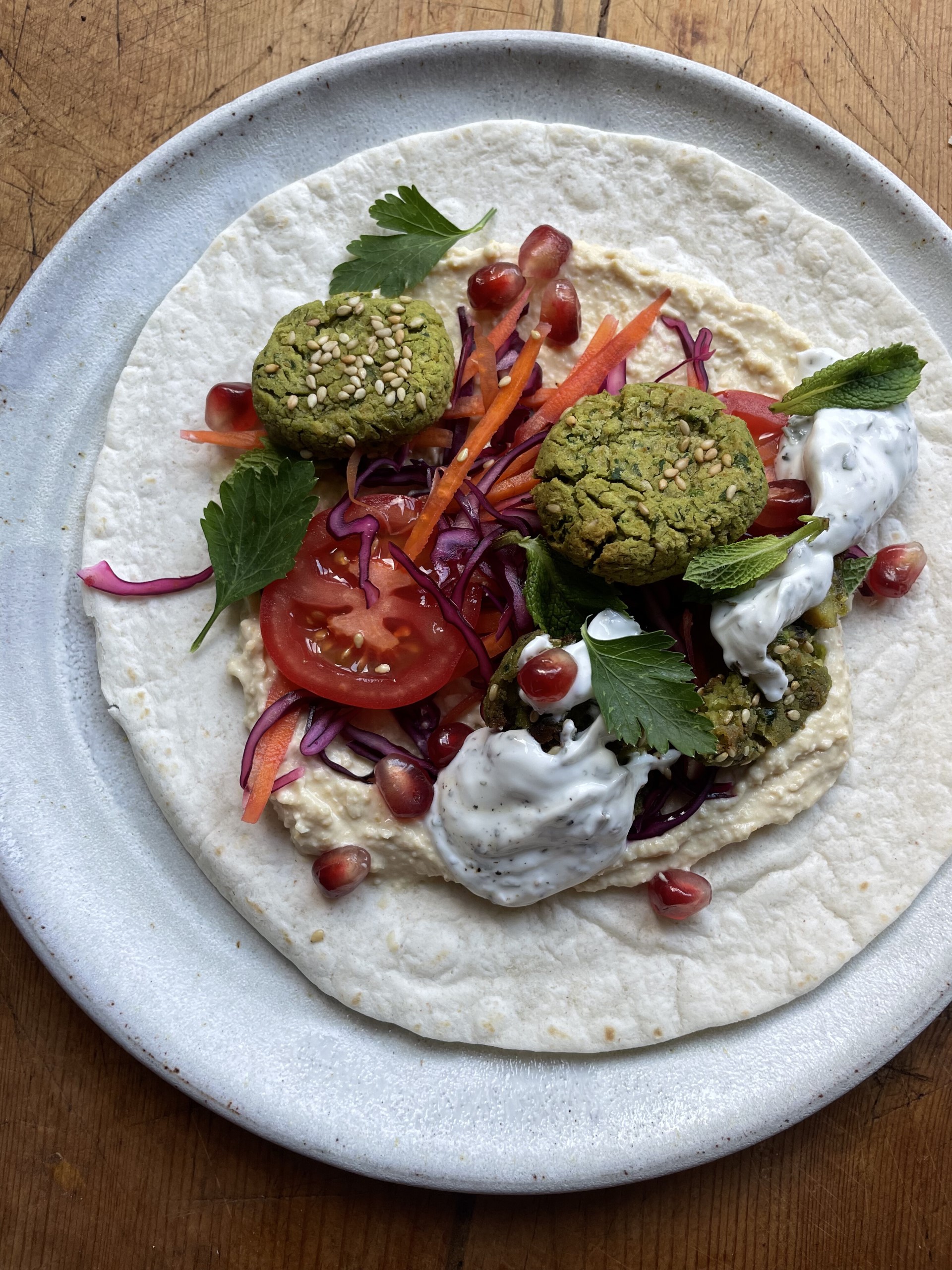 Tortilla filled with falafel and vegetables