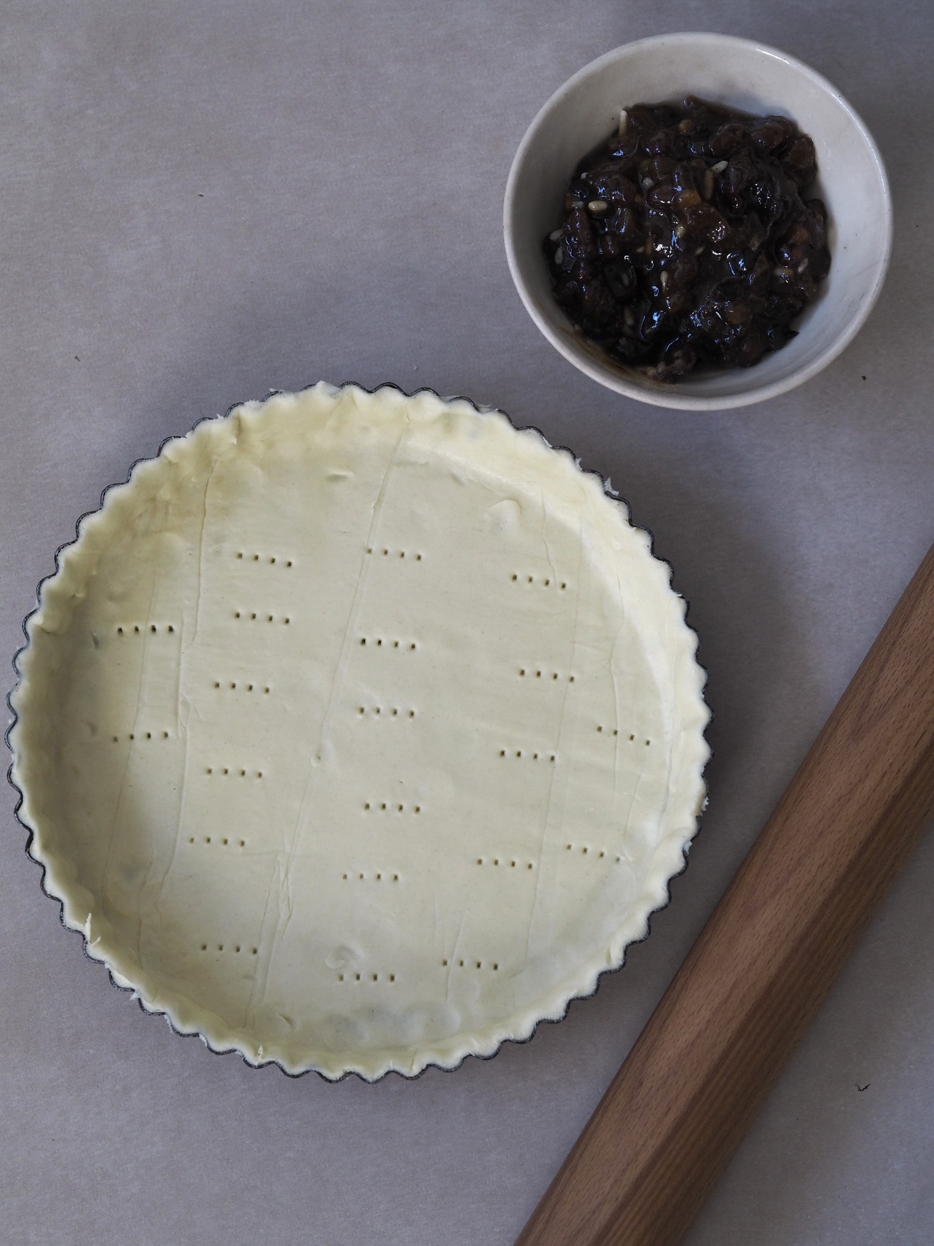 Baking dish with rolled out pastry