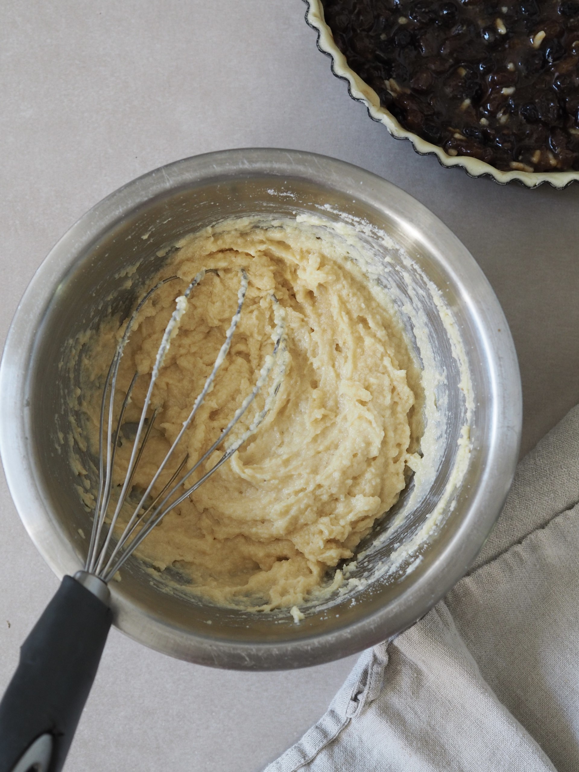 Mixing bowl with creamed butter and sugar