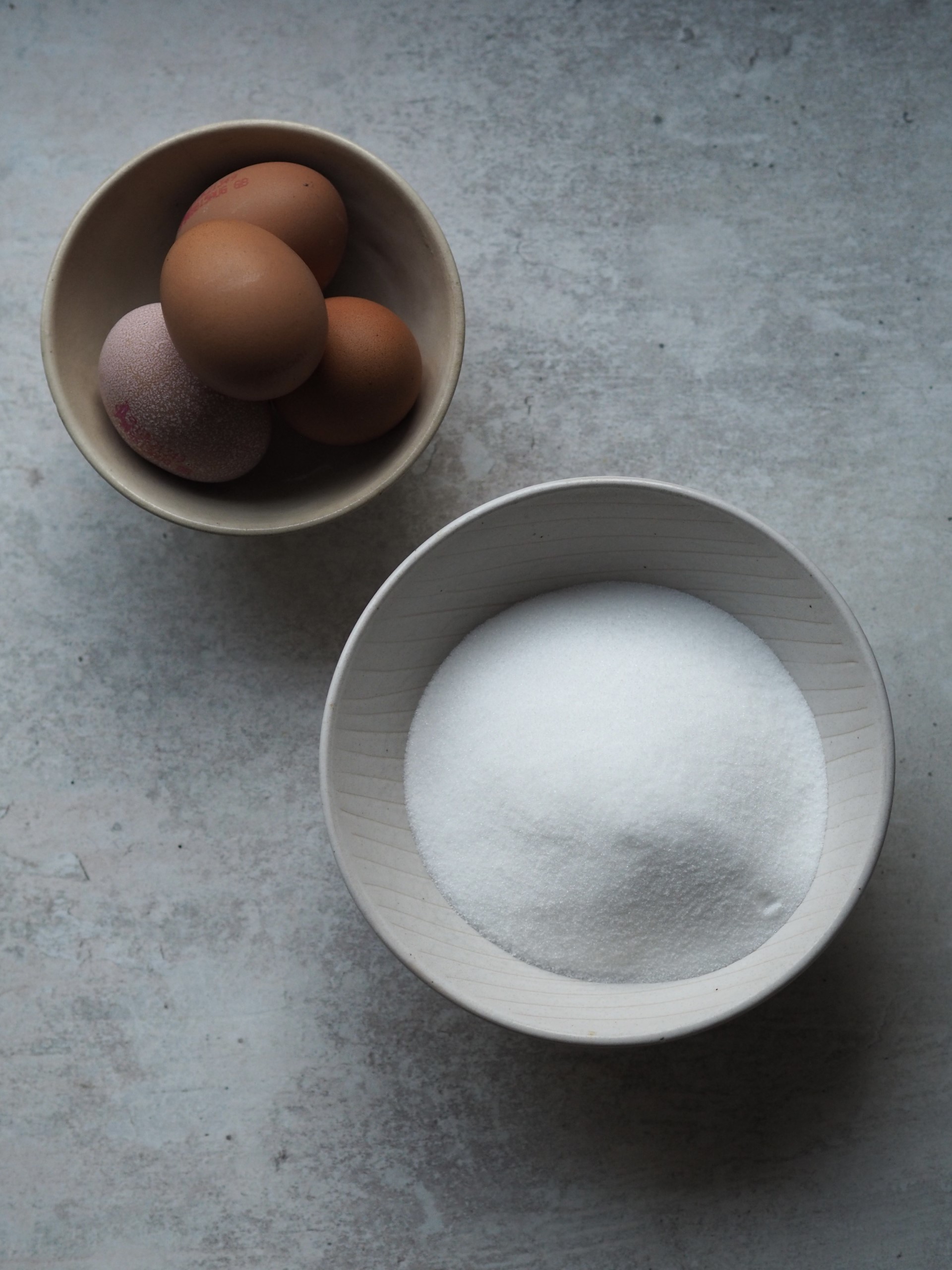 Eggs and sugar in a bowl