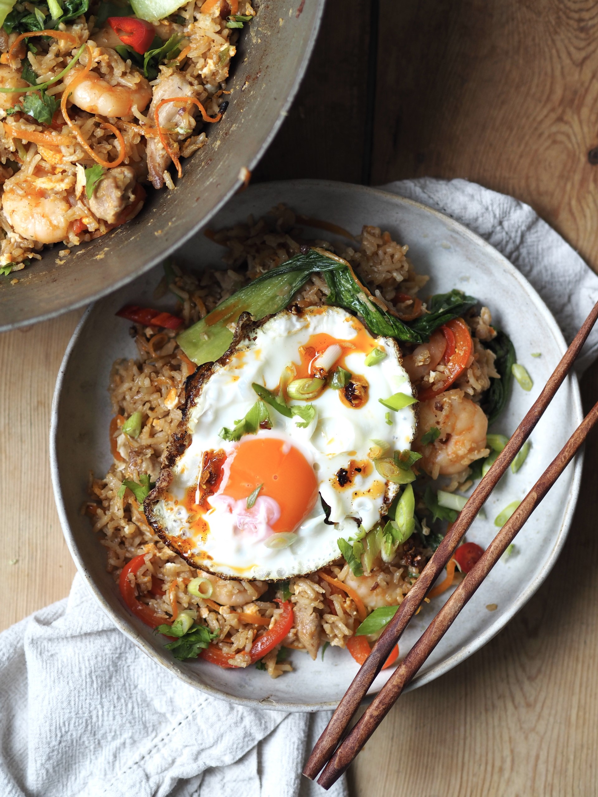 Bowl of Shrimp and Chicken Fried Rice with fried egg