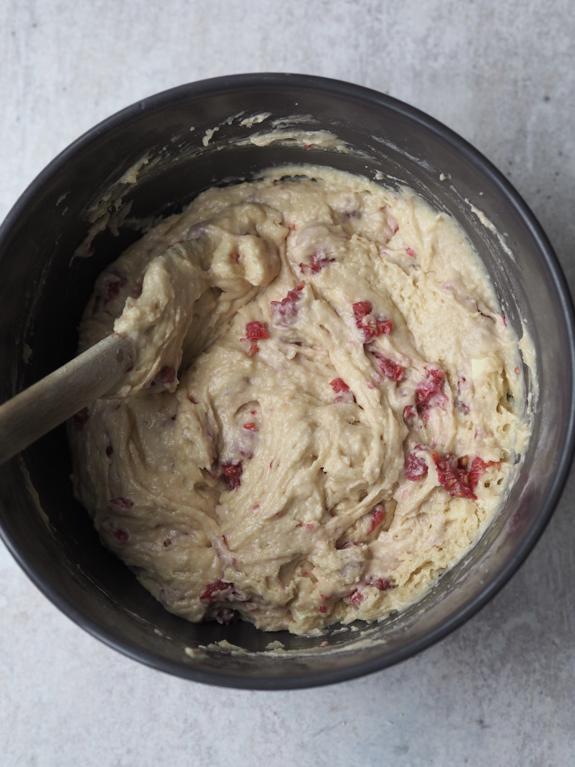 Muffin batter in a mixing bowl