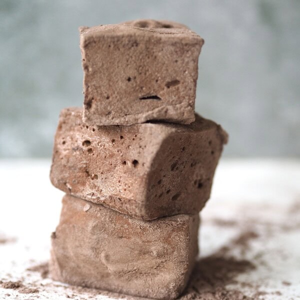 A stack of chocolate Marshmallows.