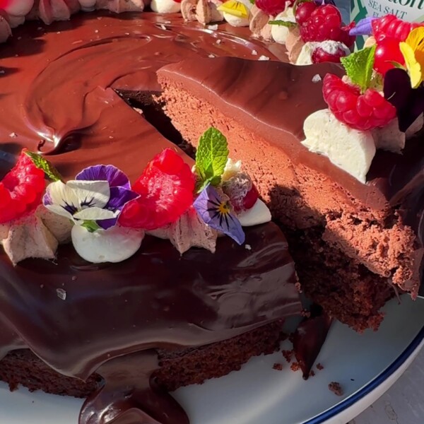 Slicing a piece of the Chocolate Cake with a knife