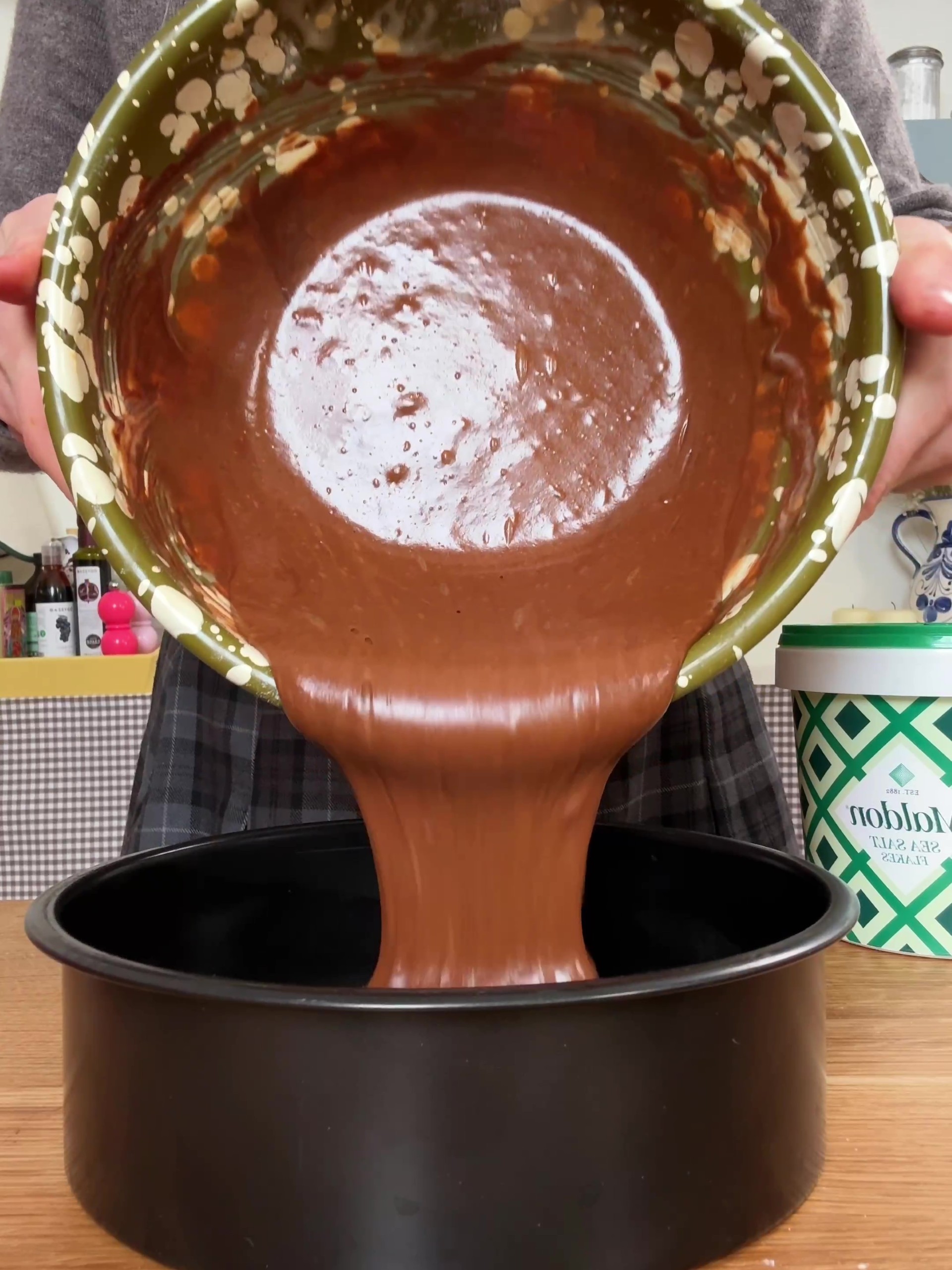 Adding batter to baking tin