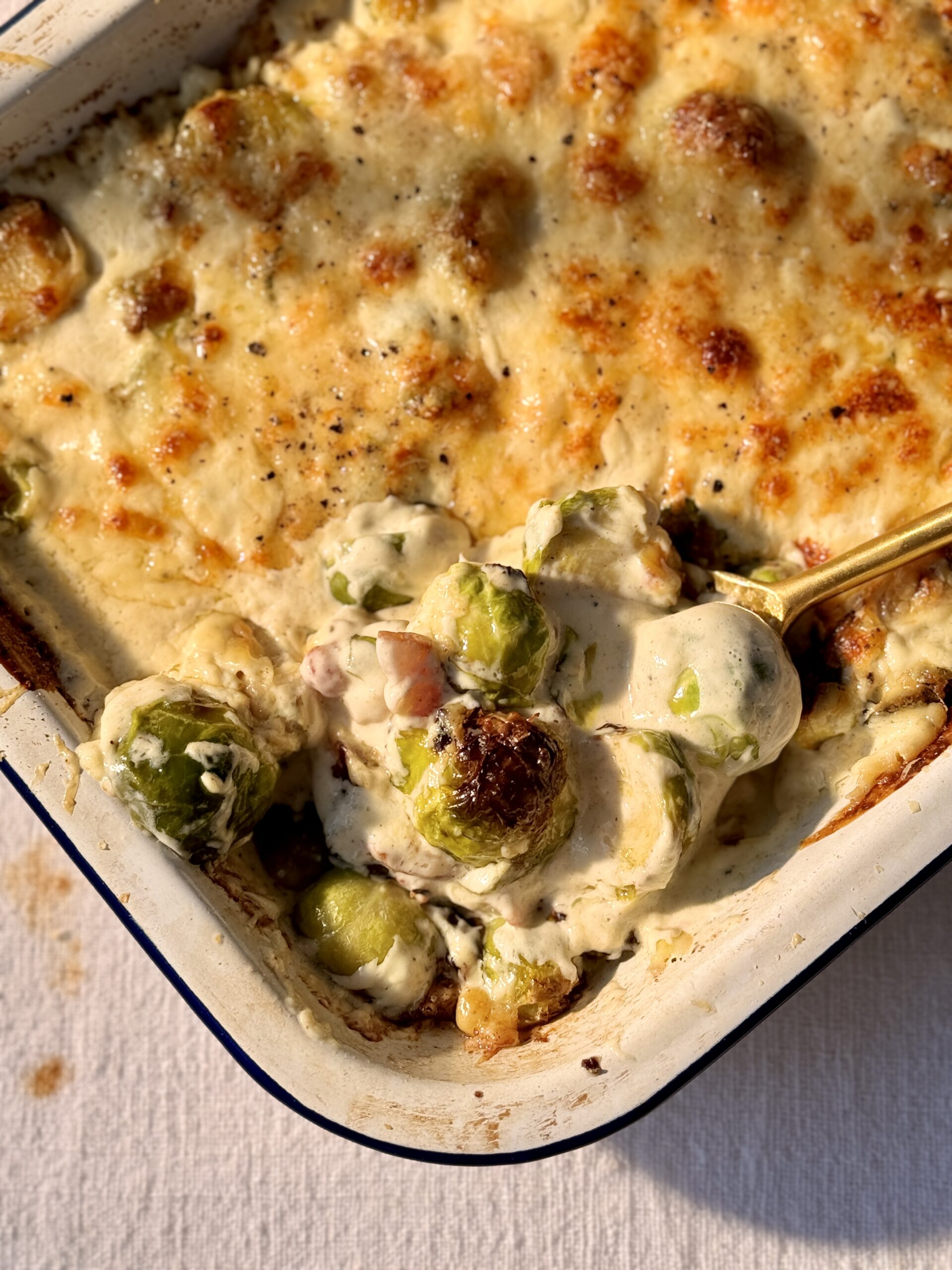 Brussels sprout casserole in a tray.