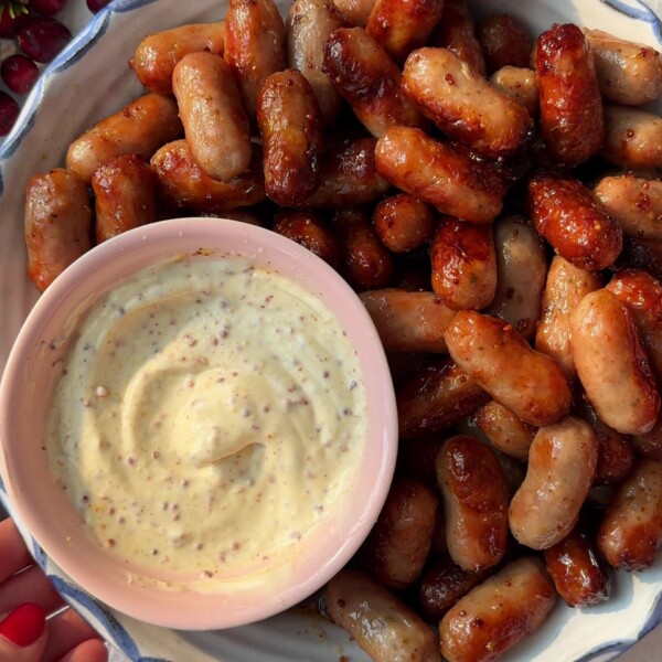 Honey Mustard Sausages in a bowl with a dip