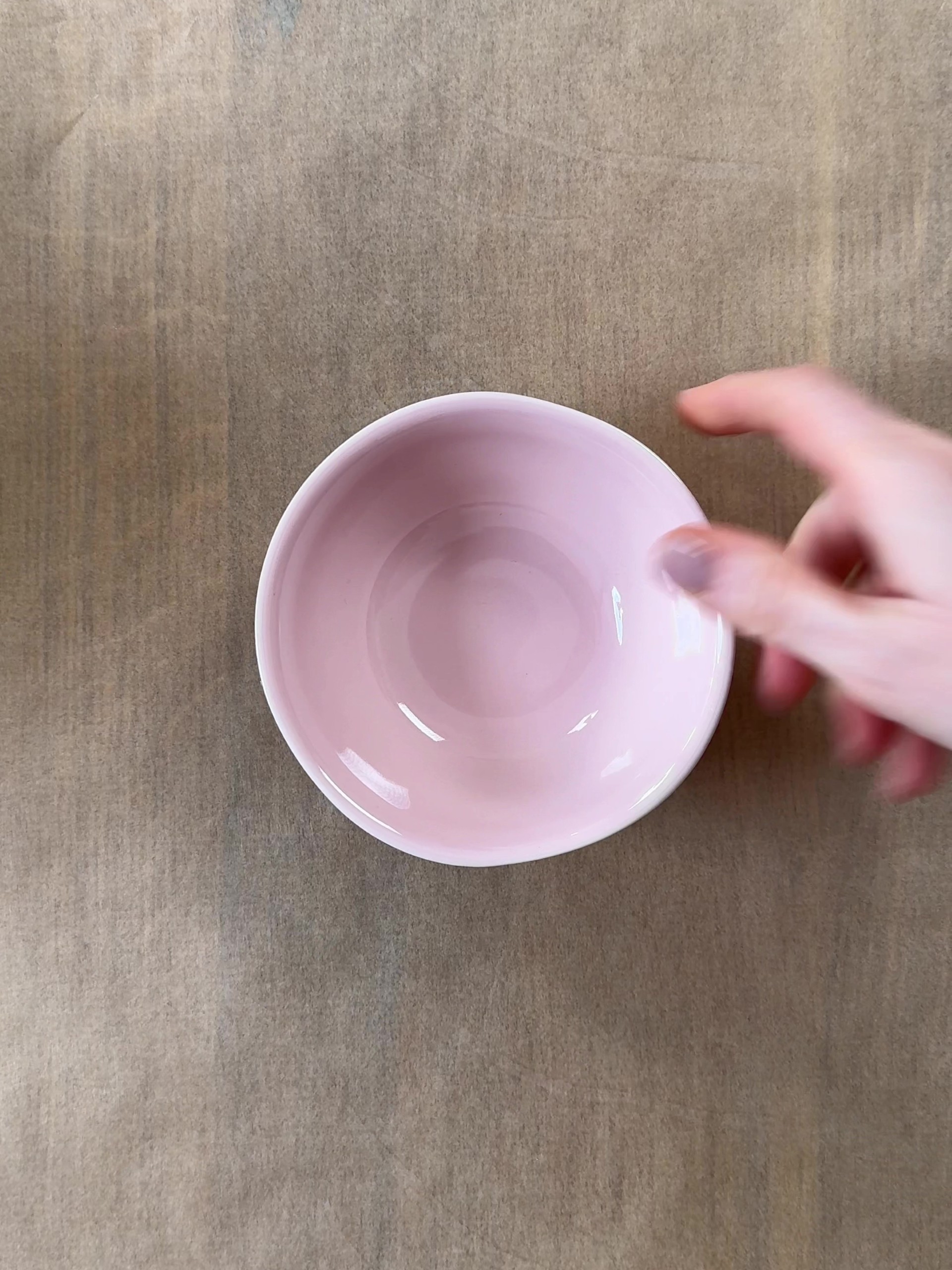 A ramekin on a baking sheet