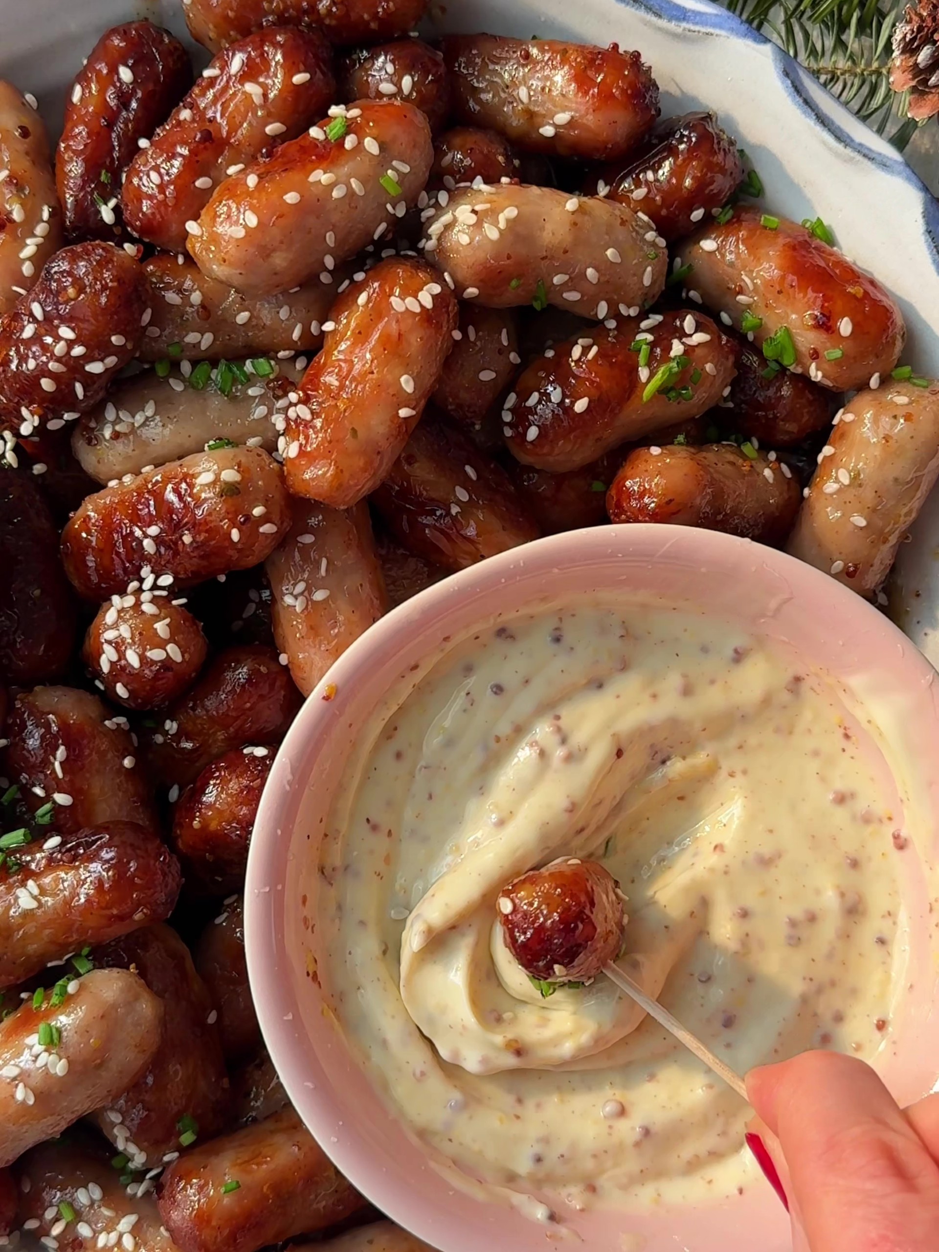 Dipping a sausage in a bowl 