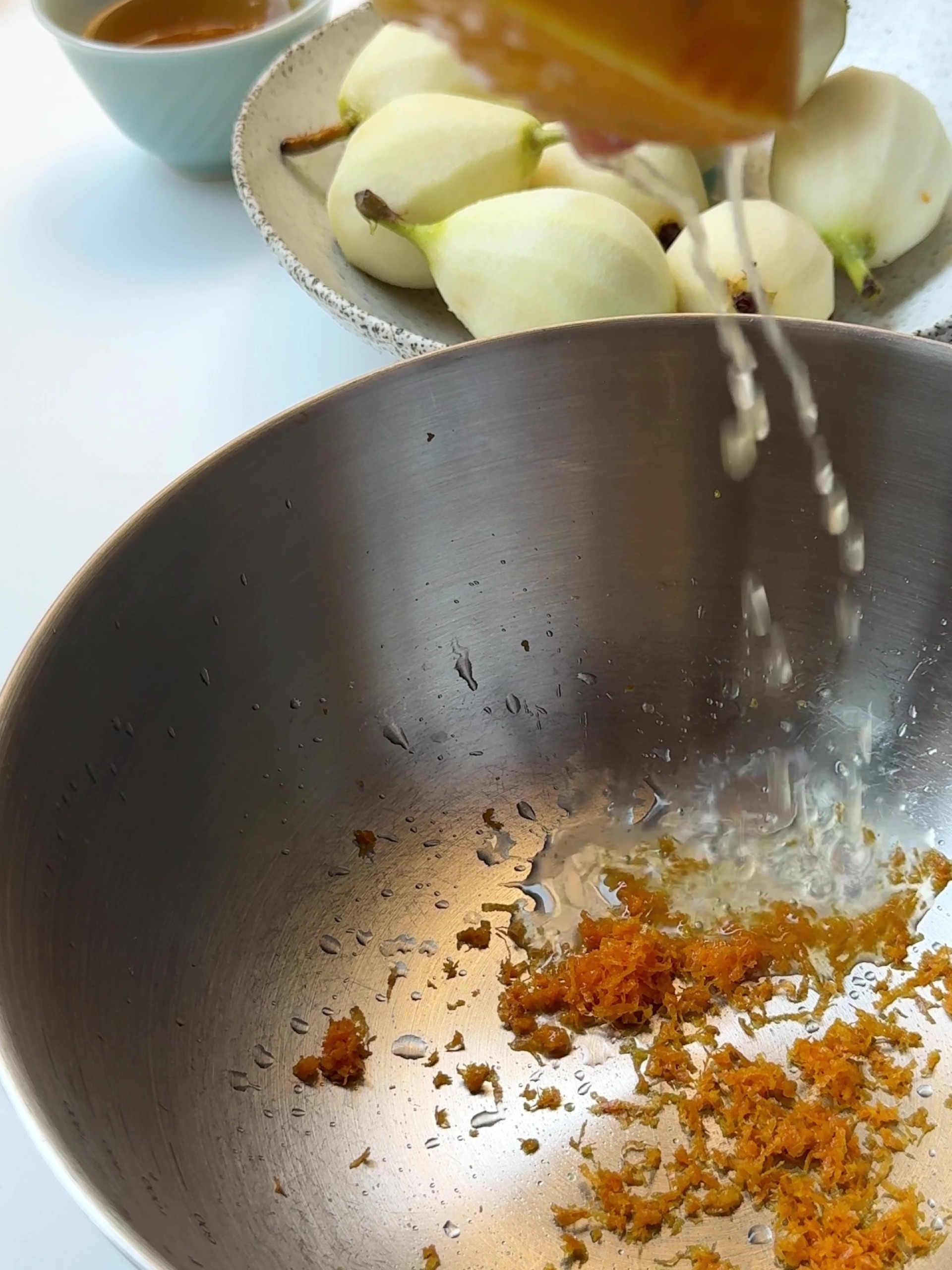 Lemon zest and juice in a pot