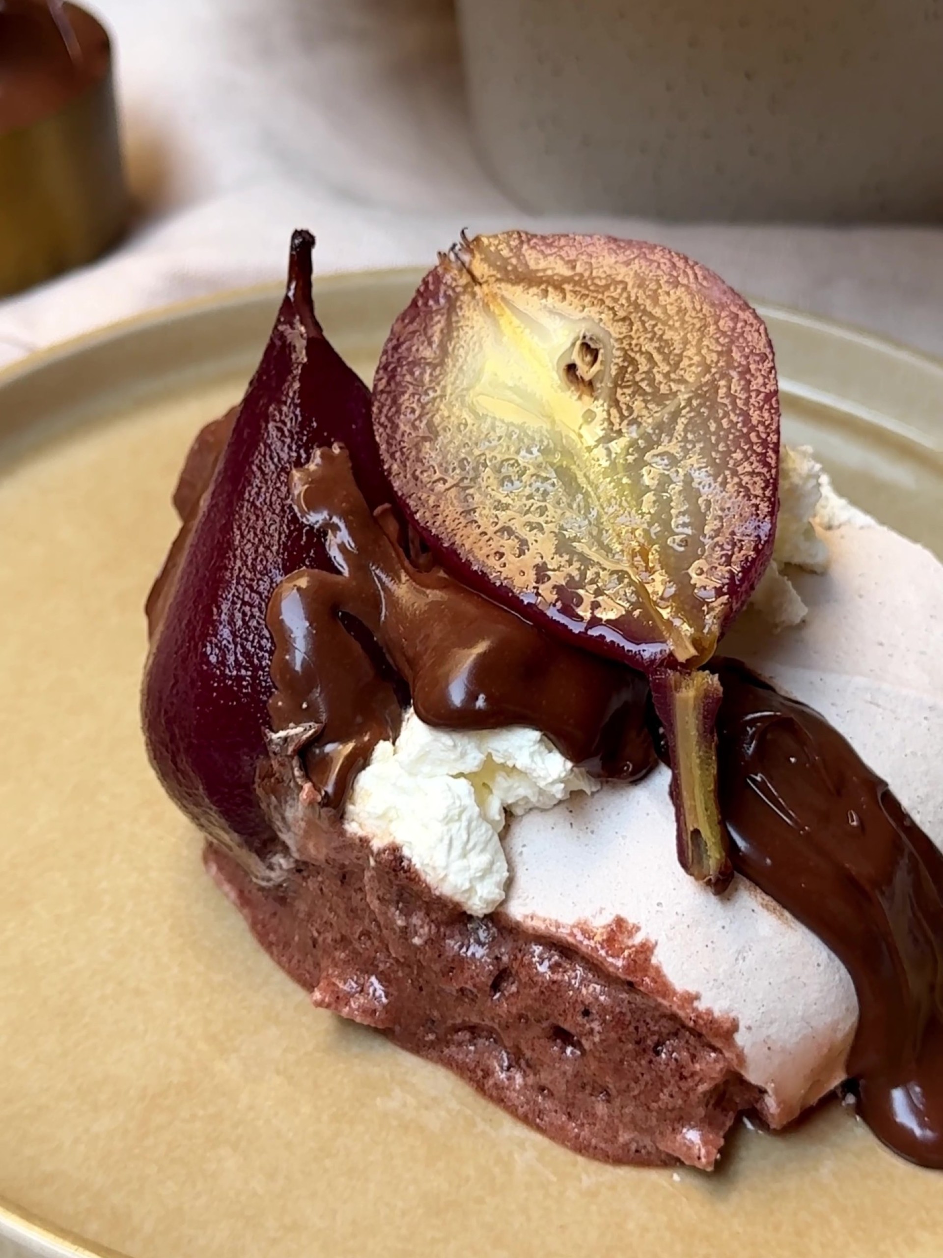 A slice of Christmas Pavlova on a side plate