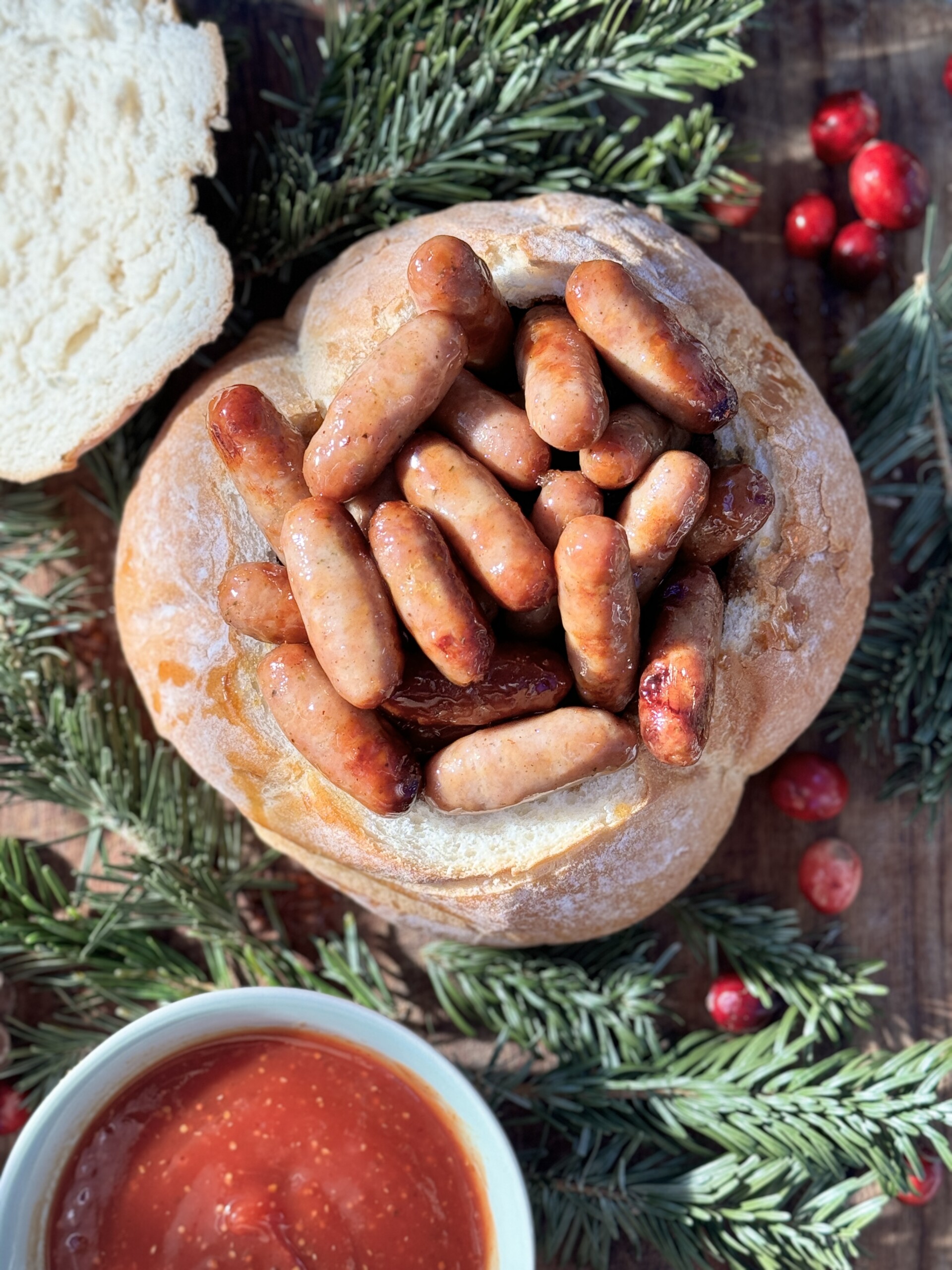 Sticky sausages in a bread bowl.