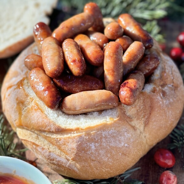 Sticky sausages in a bread bowl.