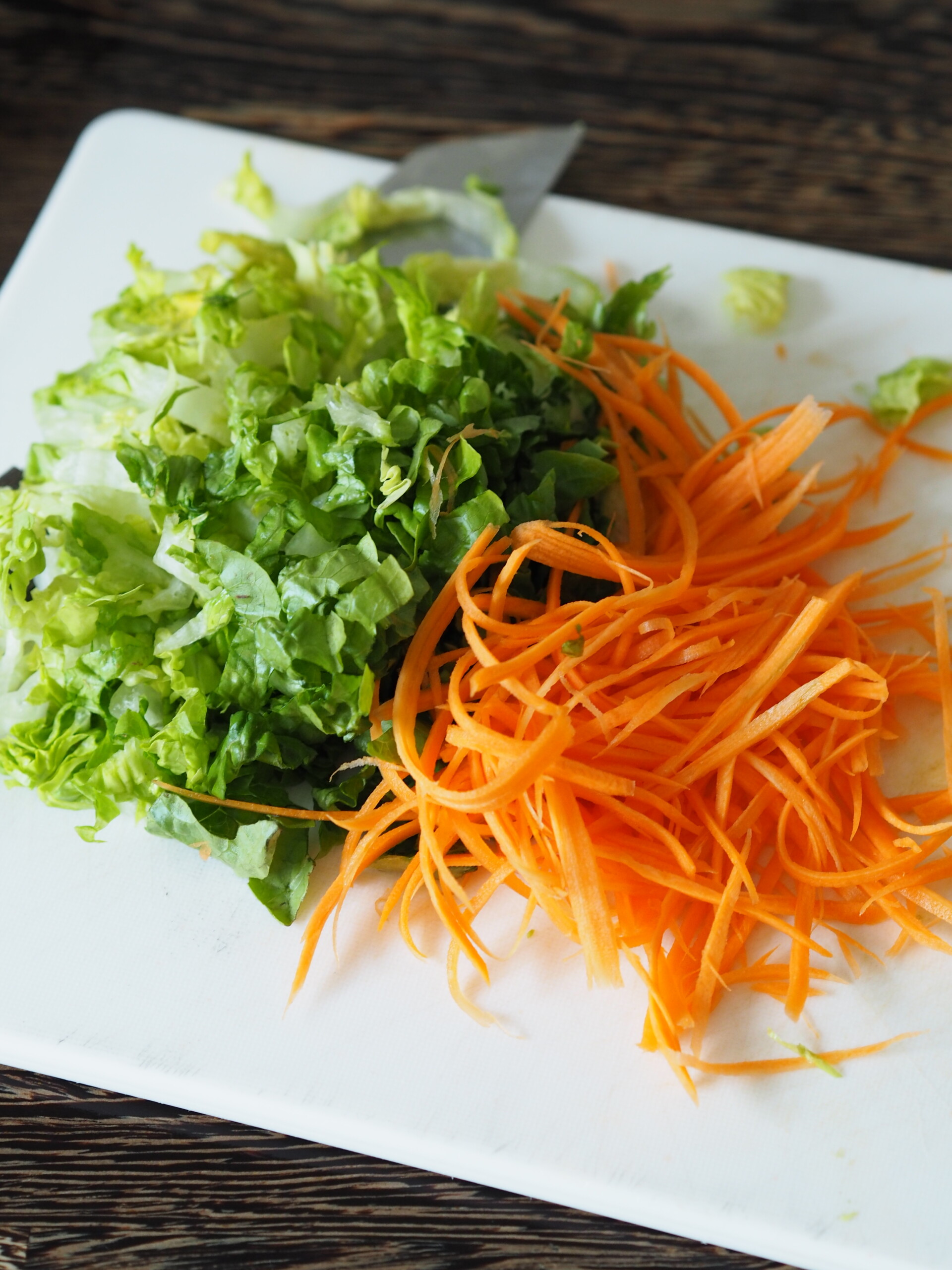 slicing the crunchy salad.